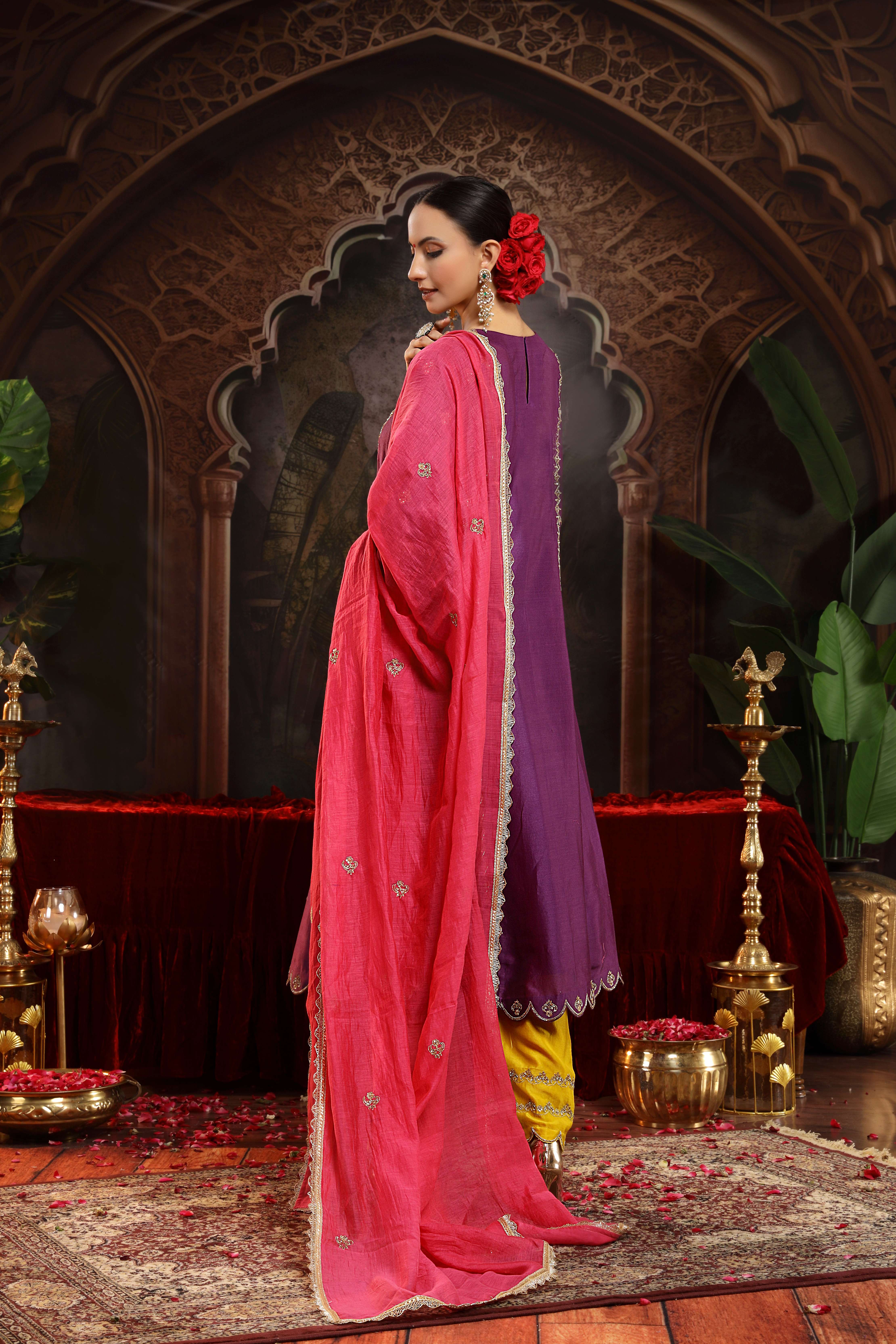 A model showcasing Mridula Purple Chanderi Silk Suit by Miku Kumar from Miku Kumar's collection