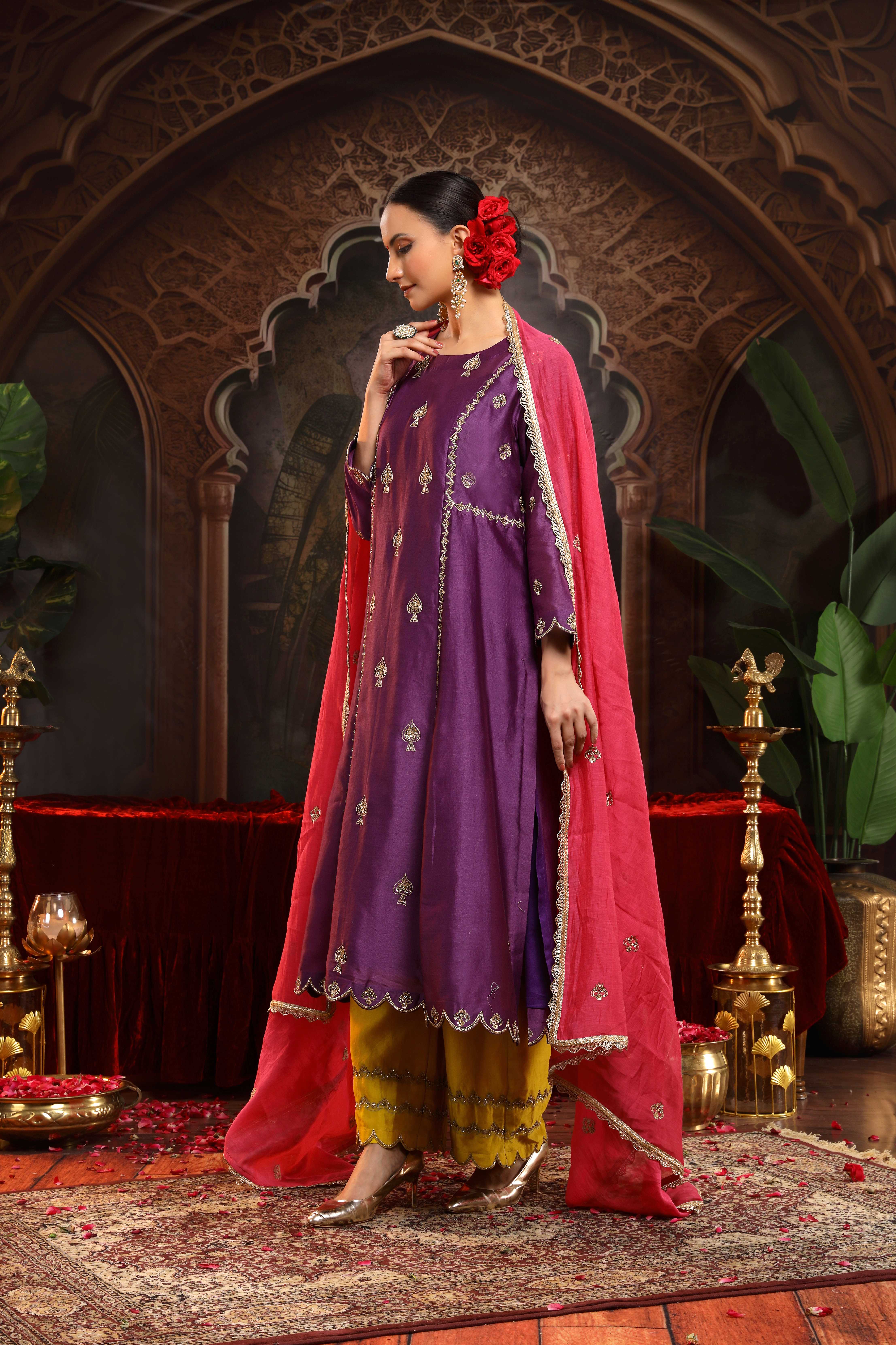 A model showcasing Mridula Purple Chanderi Silk Suit by Miku Kumar from Miku Kumar's collection