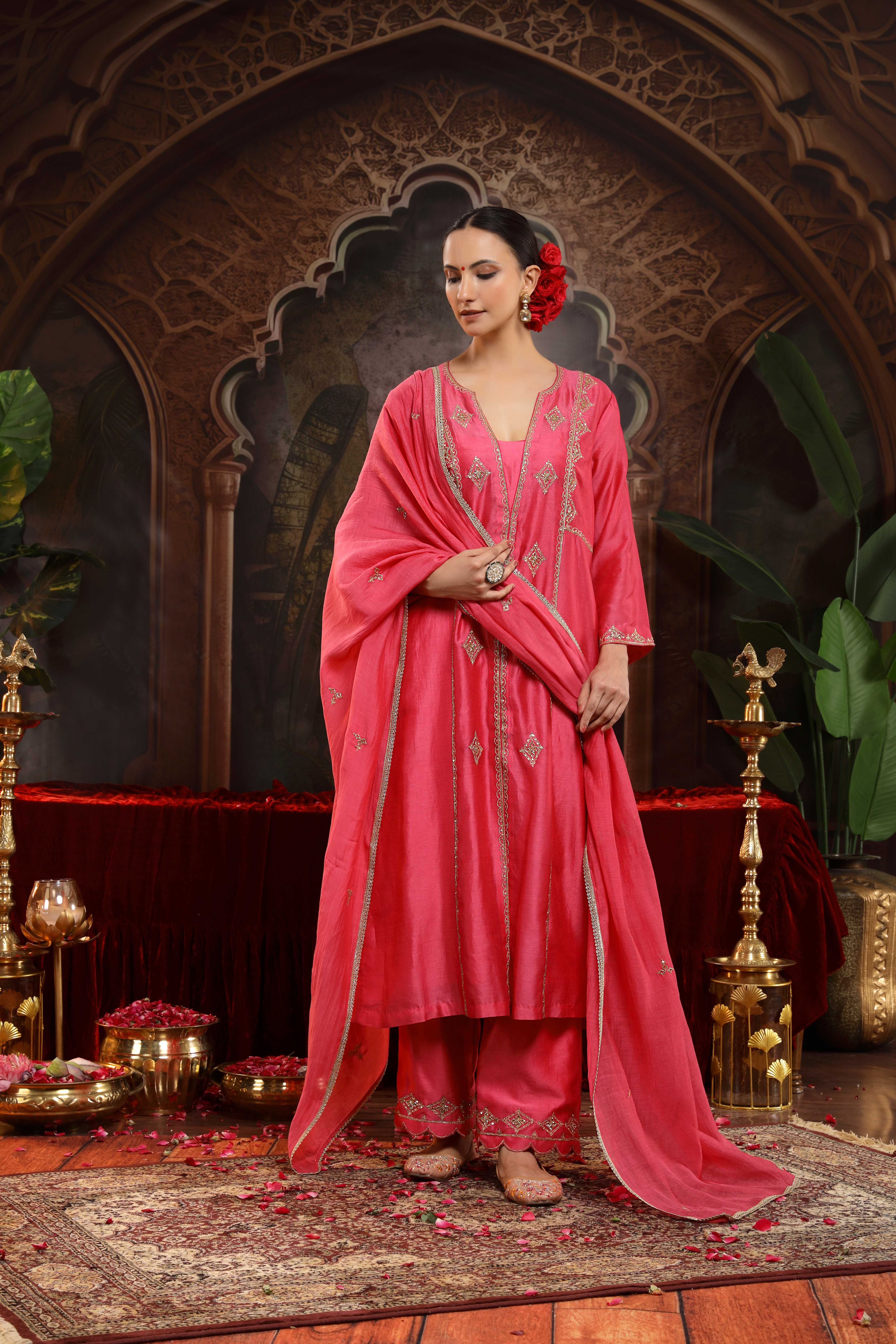 A model showcasing Suhina Hot Pink Suit Feature image by Miku Kumar from Miku Kumar's collection