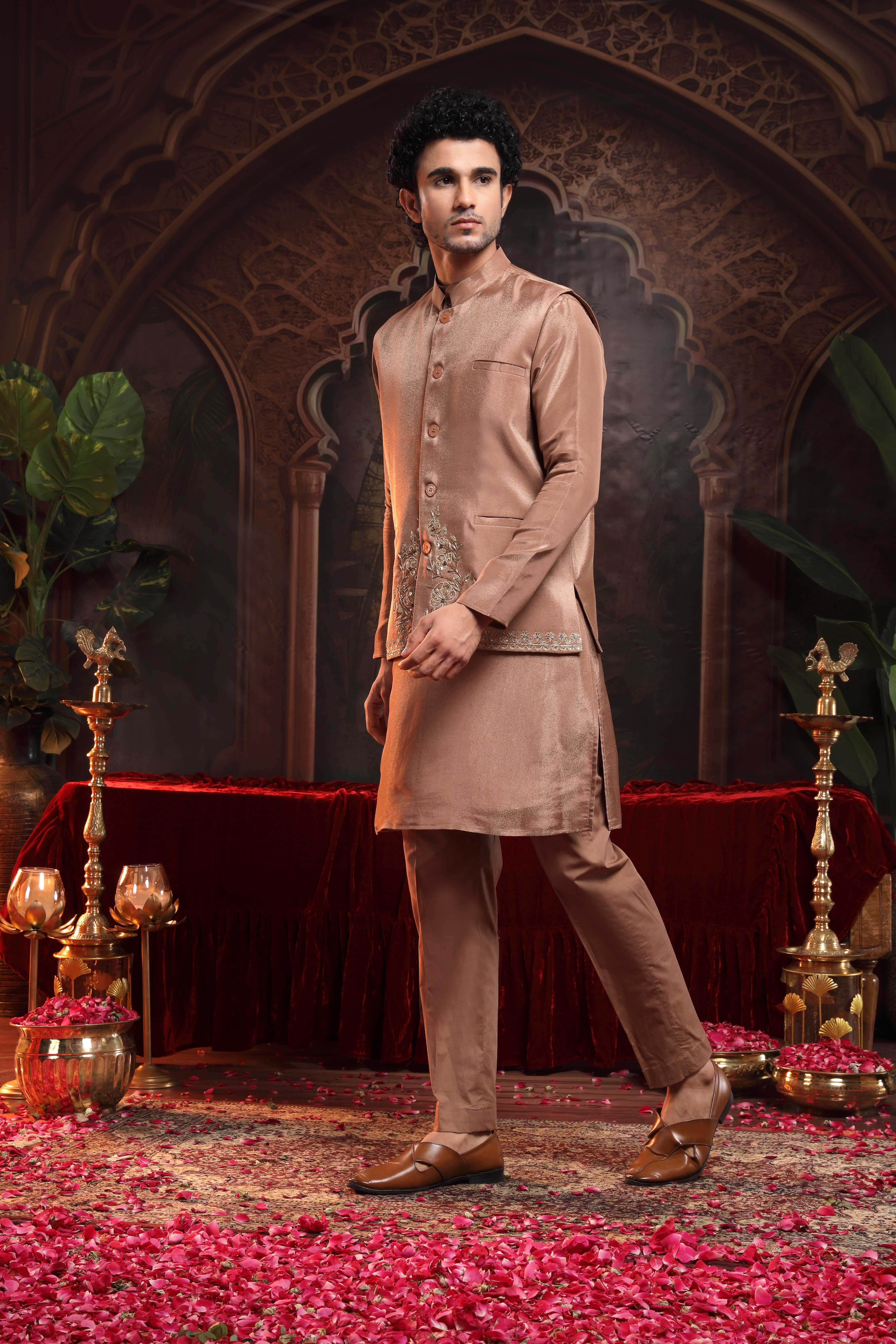 A model showcasing Tanv Copper Sherwani Set by Miku Kumar from Miku Kumar's collection