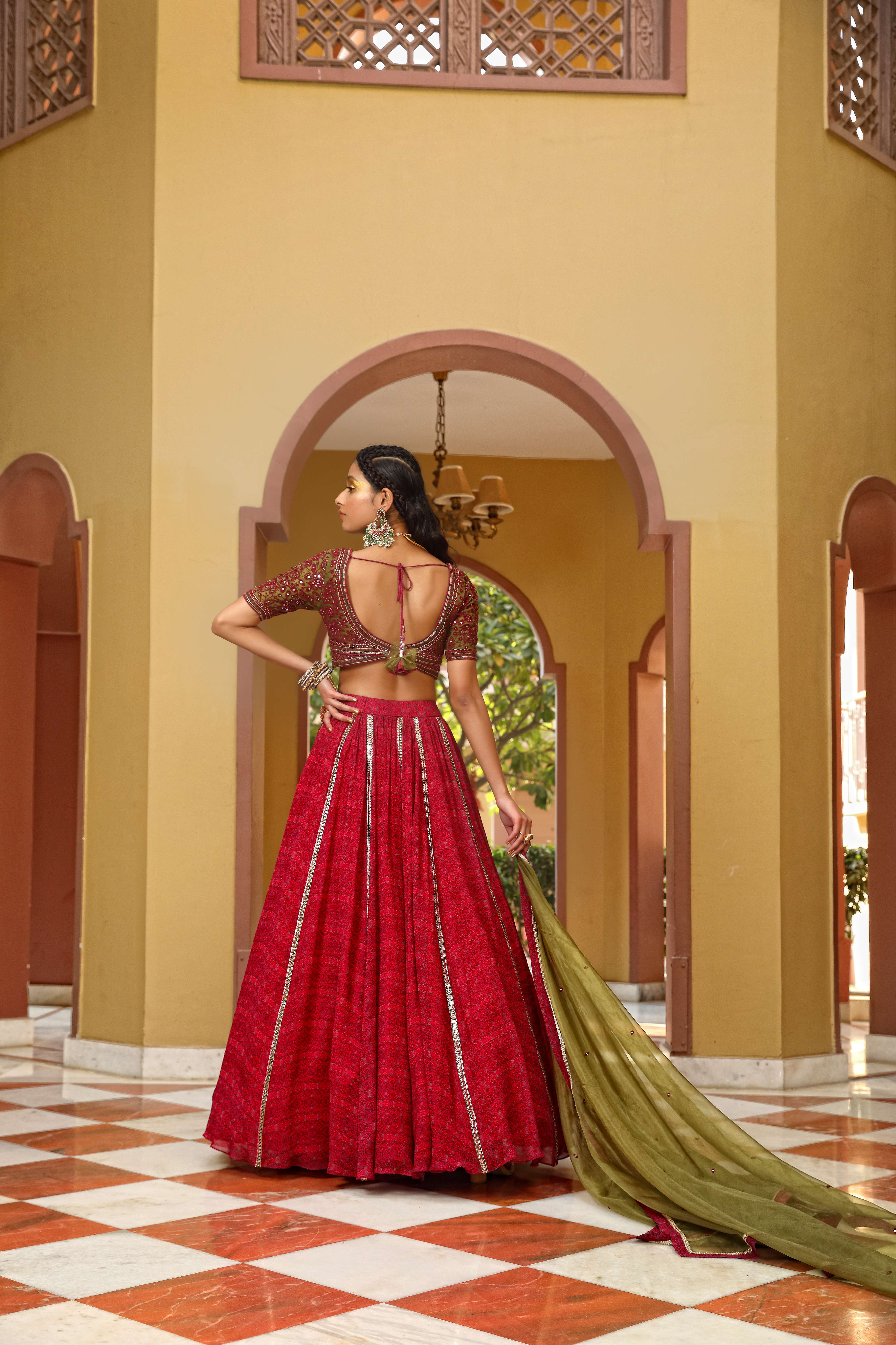 A model showcasing Lehenga Choli Set by Mavish from Mavish's collection