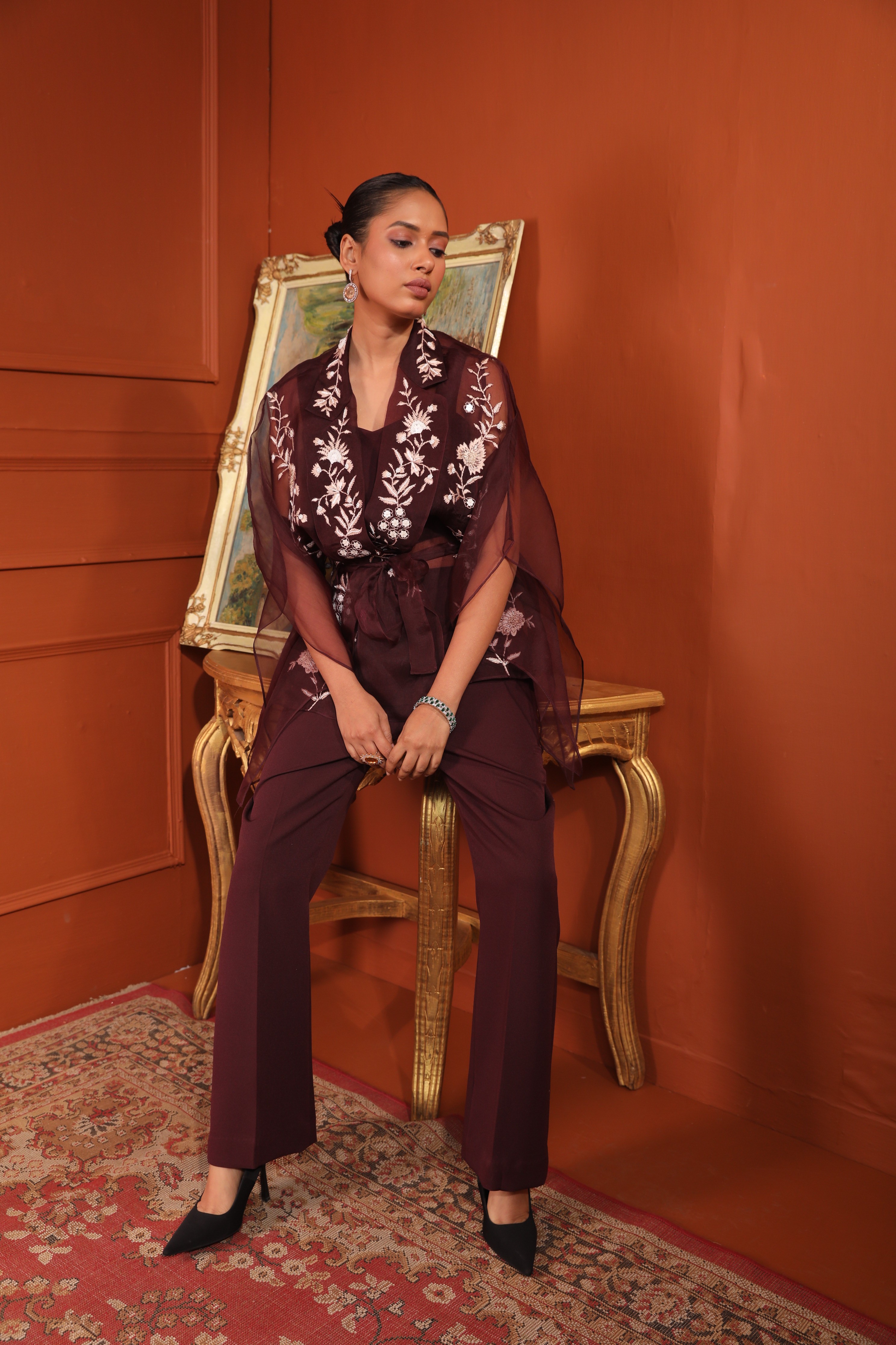 A model showcasing Kaftan Top With Bustier Pants by Mavish from Mavish's collection