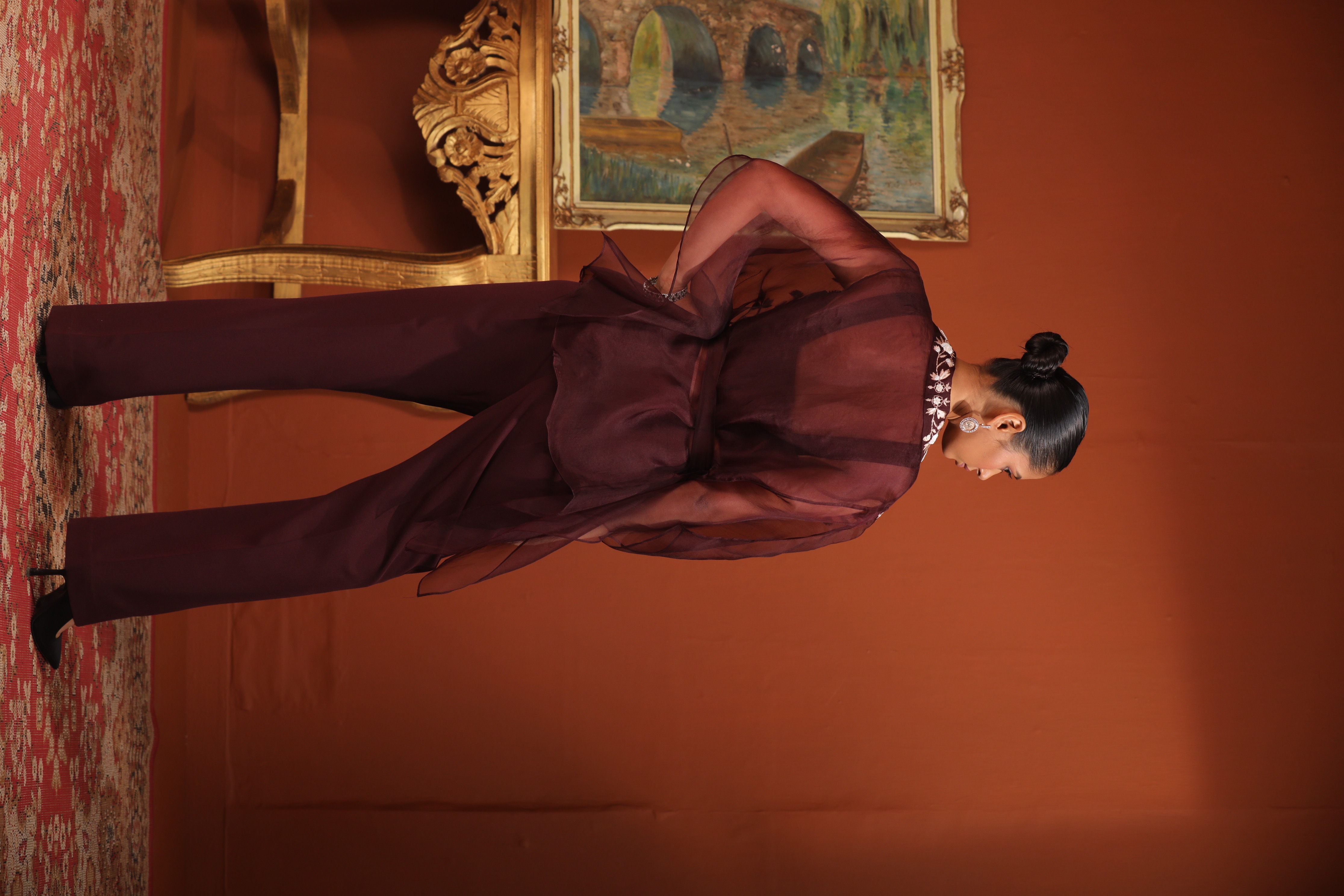 A model showcasing Kaftan Top With Bustier Pants by Mavish from Mavish's collection