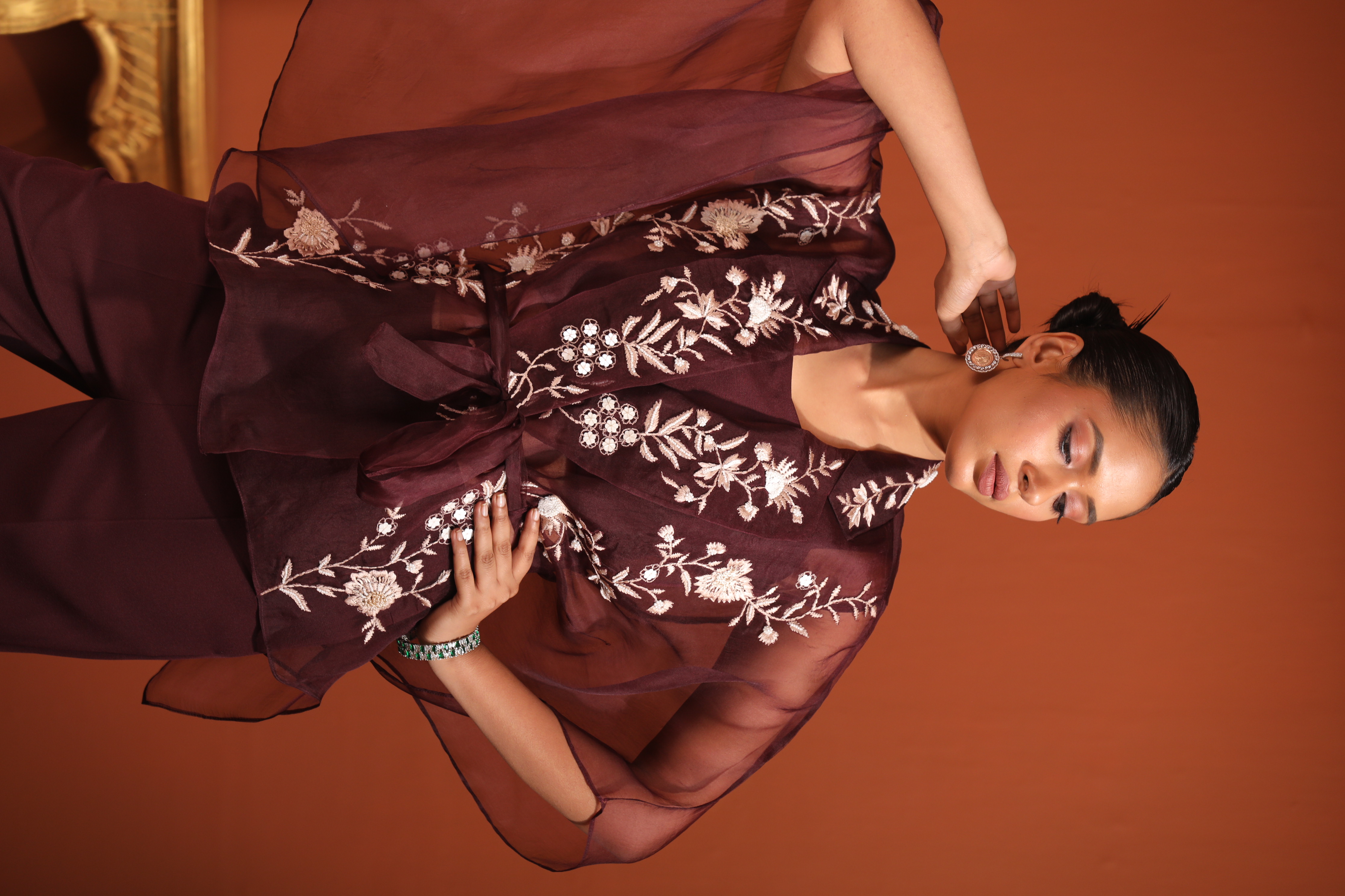 A model showcasing Kaftan Top With Bustier Pants by Mavish from Mavish's collection