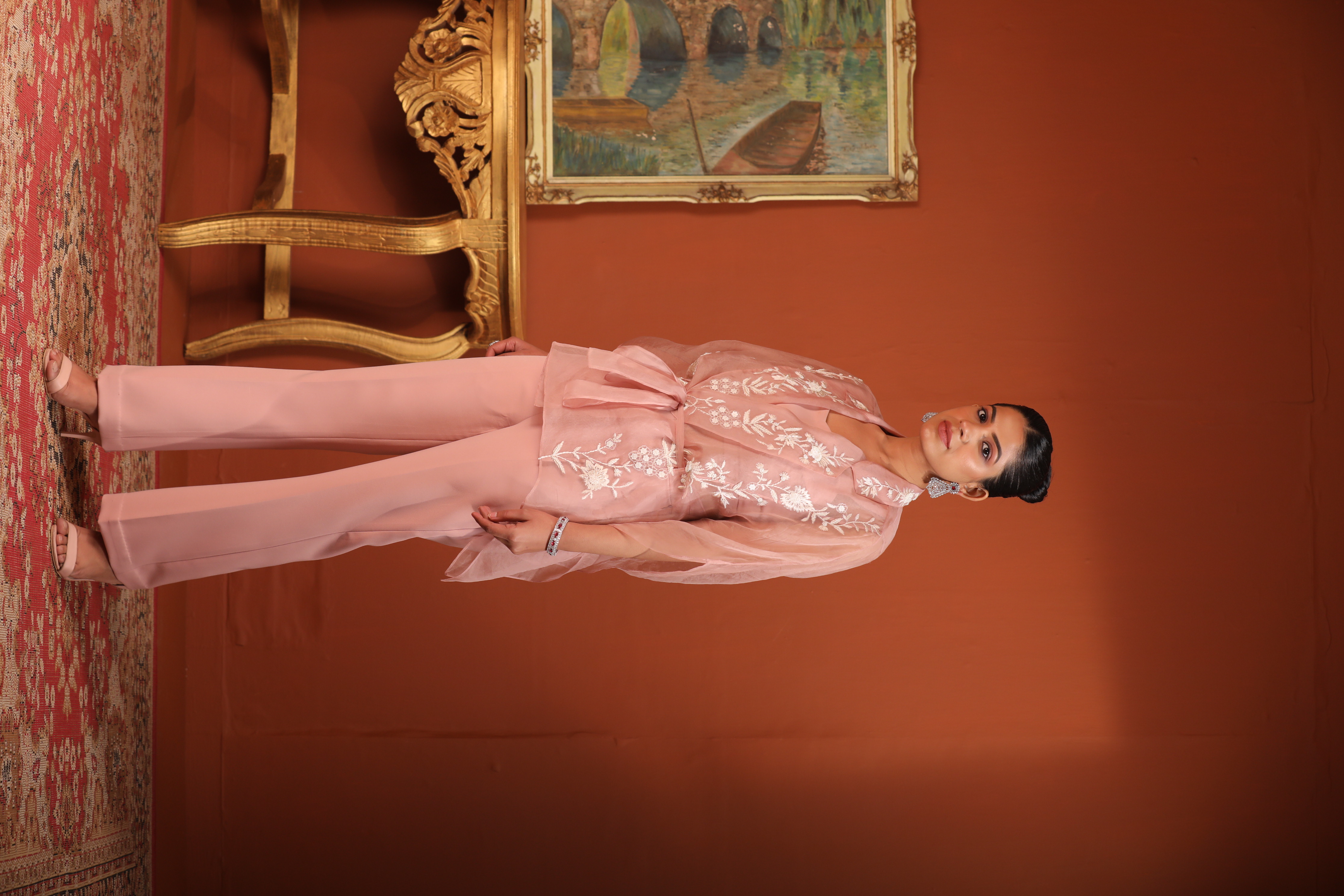 A model showcasing Pink Kaftan Top With Bustier Pants by Mavish from Mavish's collection
