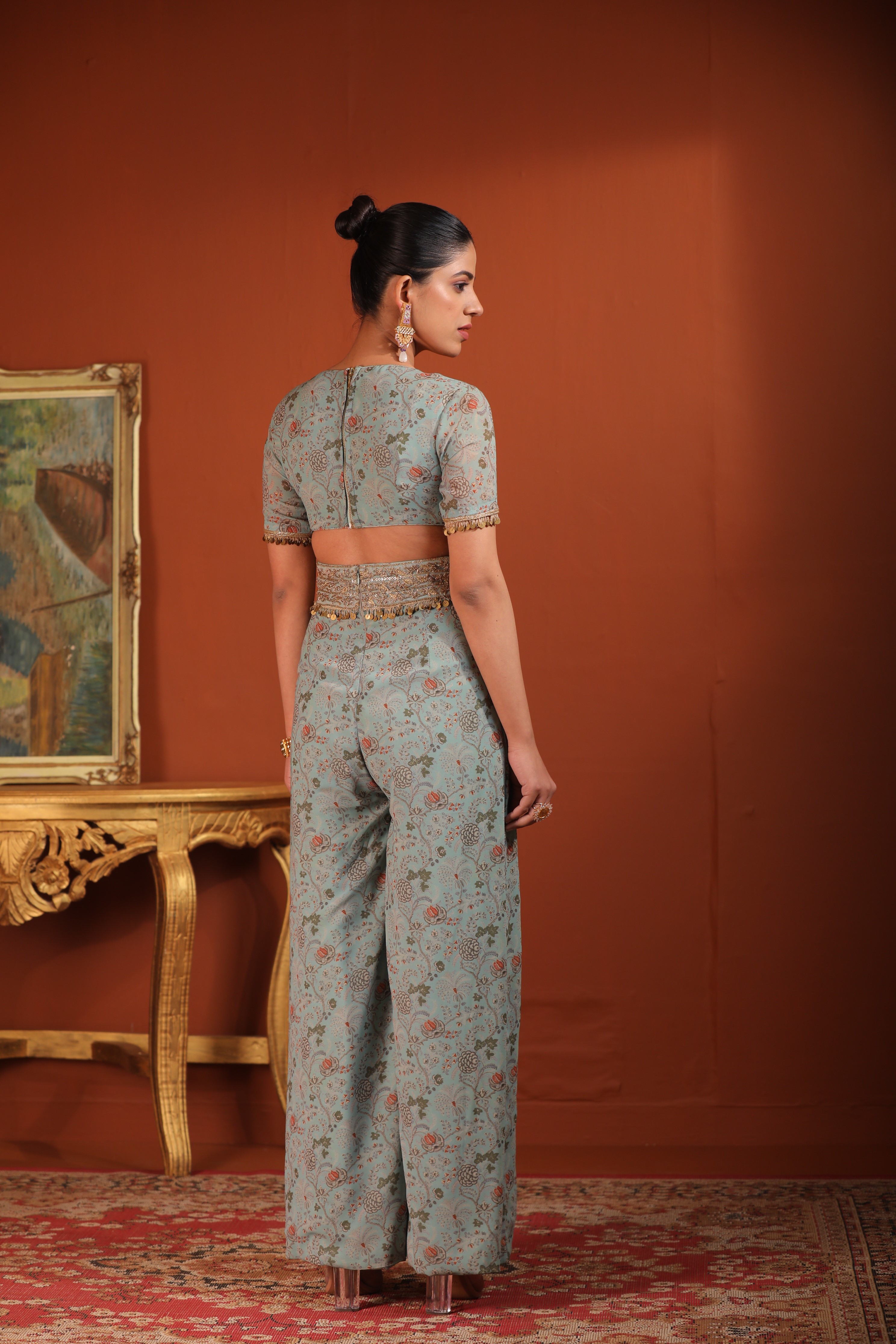 A model showcasing Jumsuit With Waist Cut Out by Mavish from Mavish's collection
