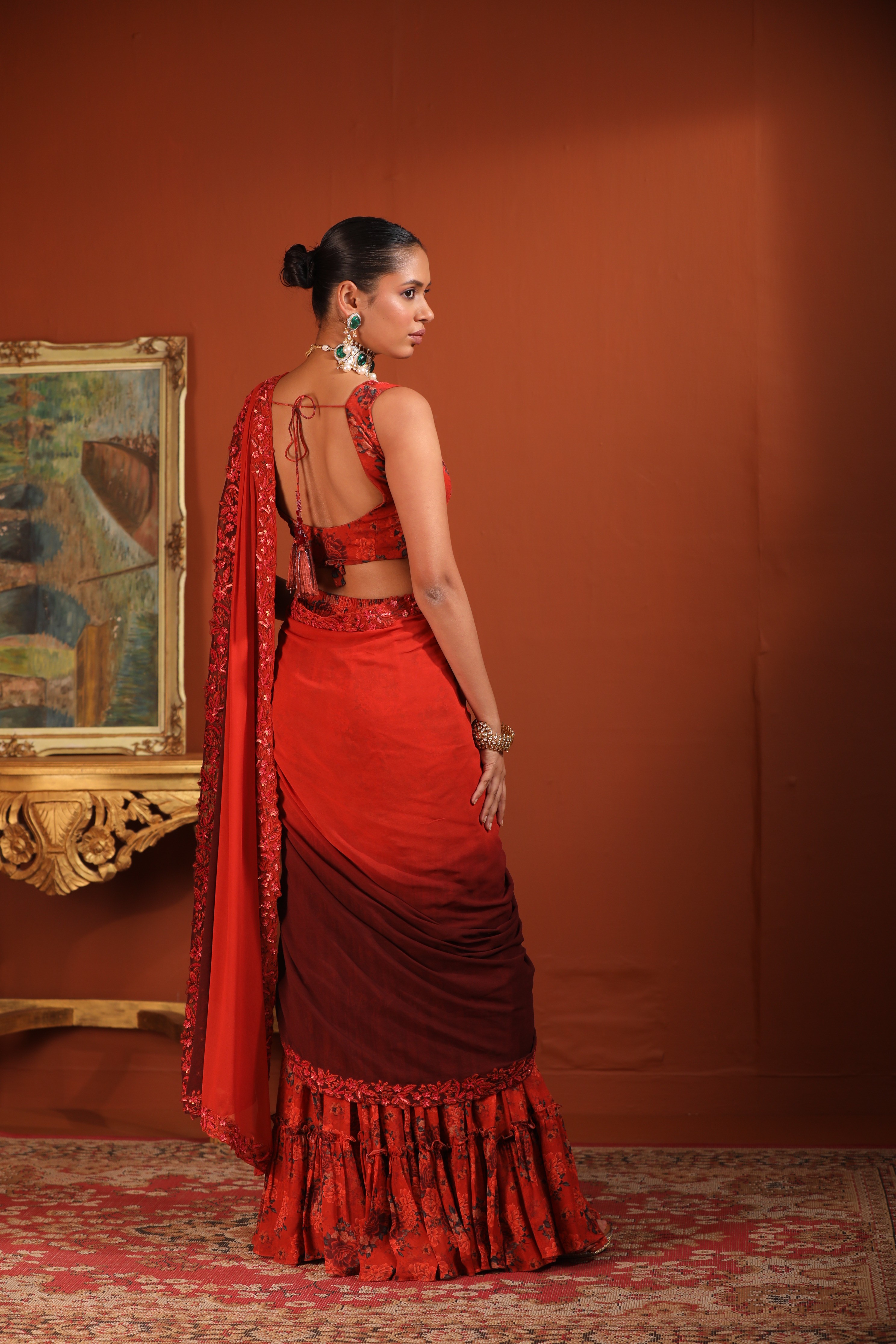 A model showcasing Pre Draped Sharara Saree by Mavish from Mavish's collection