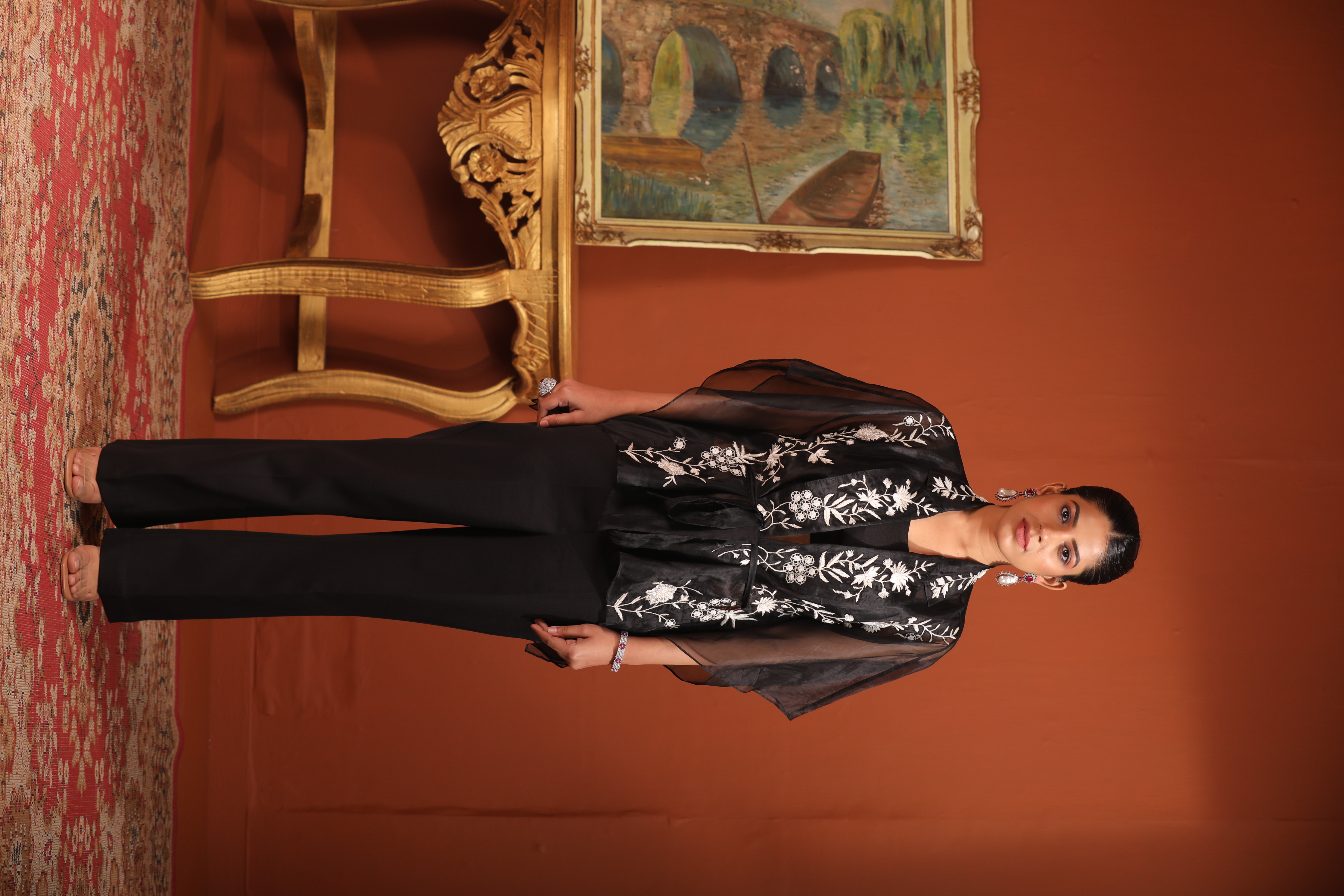 A model showcasing Black Kaftan Top With Bustier Pants Feature image by Mavish from Mavish's collection