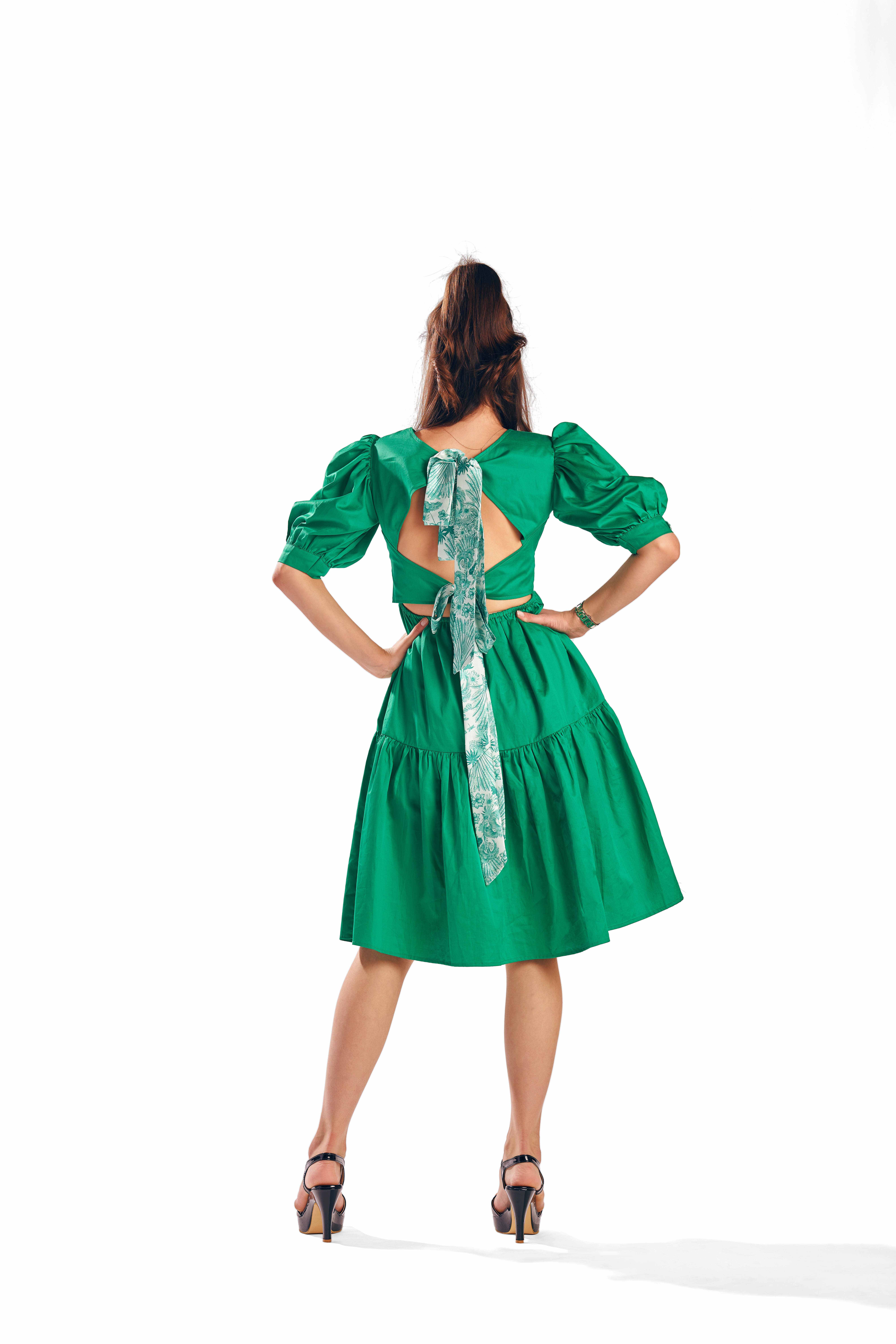 A model showcasing Azure Alcedo Green Dress by Zilaire from Zilaire's collection
