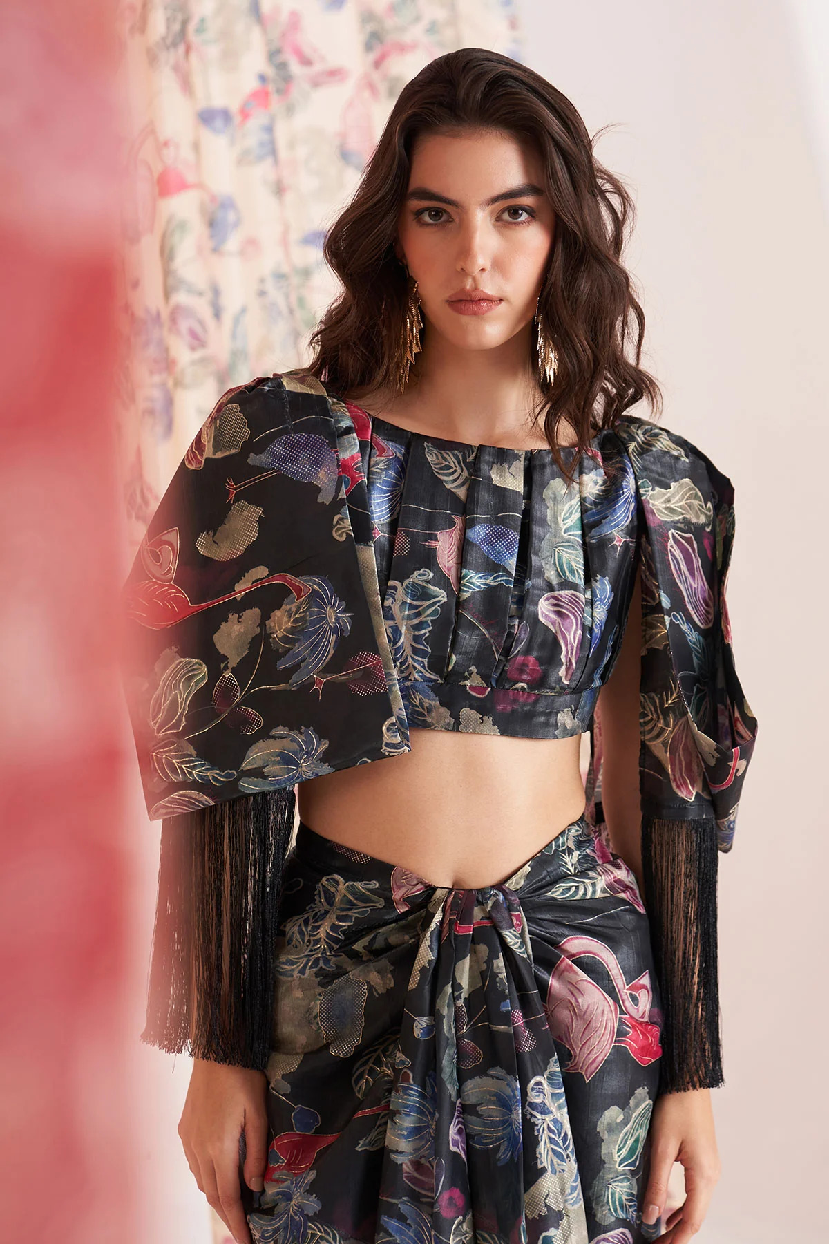 A model showcasing Duck Black Fringe Skirt Coord Set by Puneet Kapoor Label from Puneet Kapoor Label's collection A model showcasing Duck Black Fringe Skirt Coord Set by Puneet Kapoor Label from Puneet Kapoor Label's collection