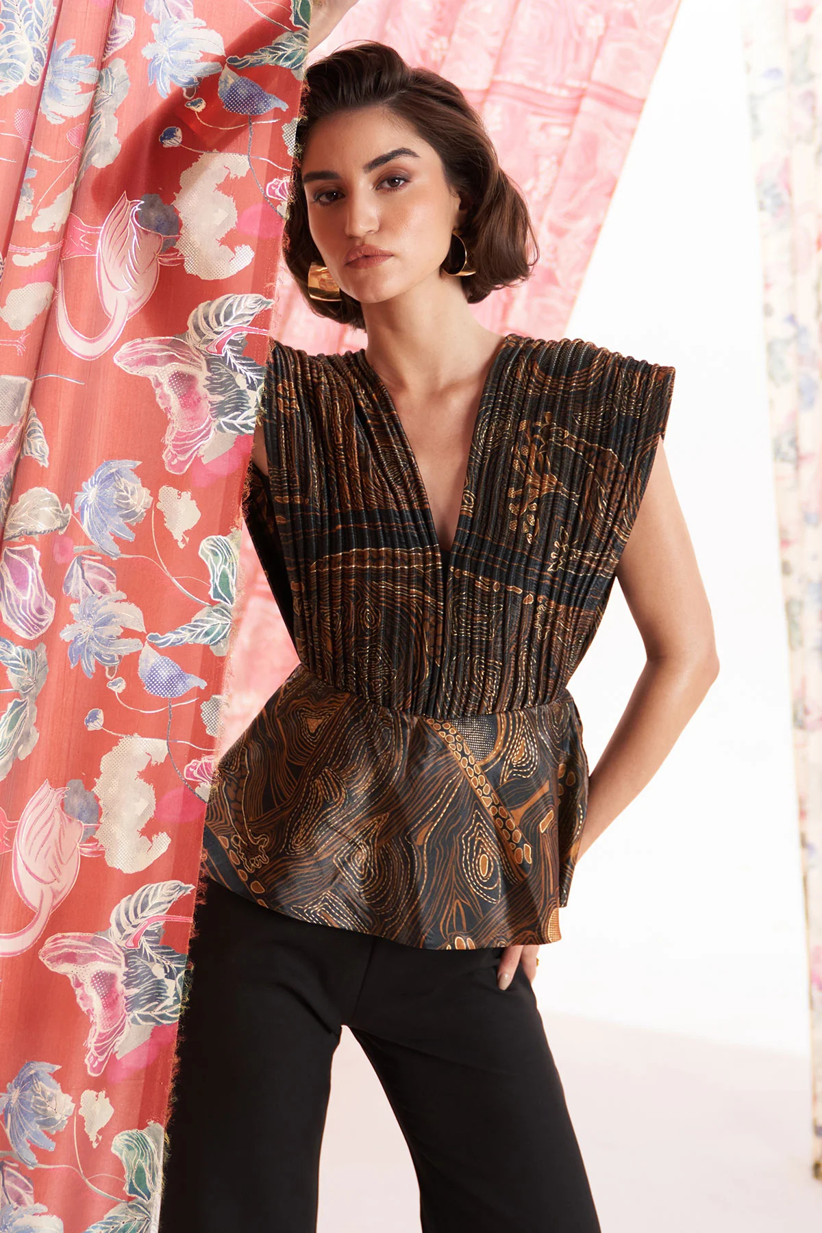 A model showcasing Zebradori Jumpsuit by Puneet Kapoor Label from Puneet Kapoor Label's collection A model showcasing Zebradori Jumpsuit by Puneet Kapoor Label from Puneet Kapoor Label's collection