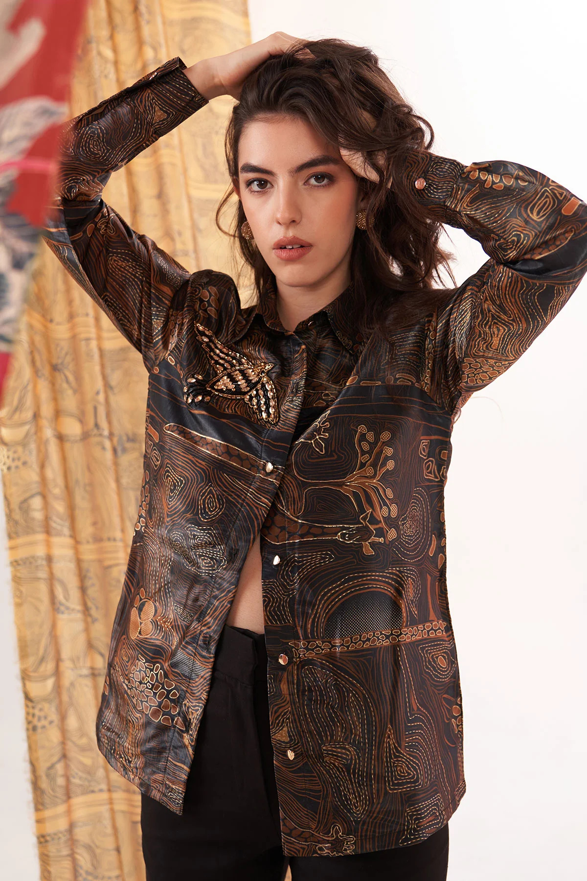 A model showcasing Brown Zebra Print Applique Shirt by Puneet Kapoor Label from Puneet Kapoor Label's collection