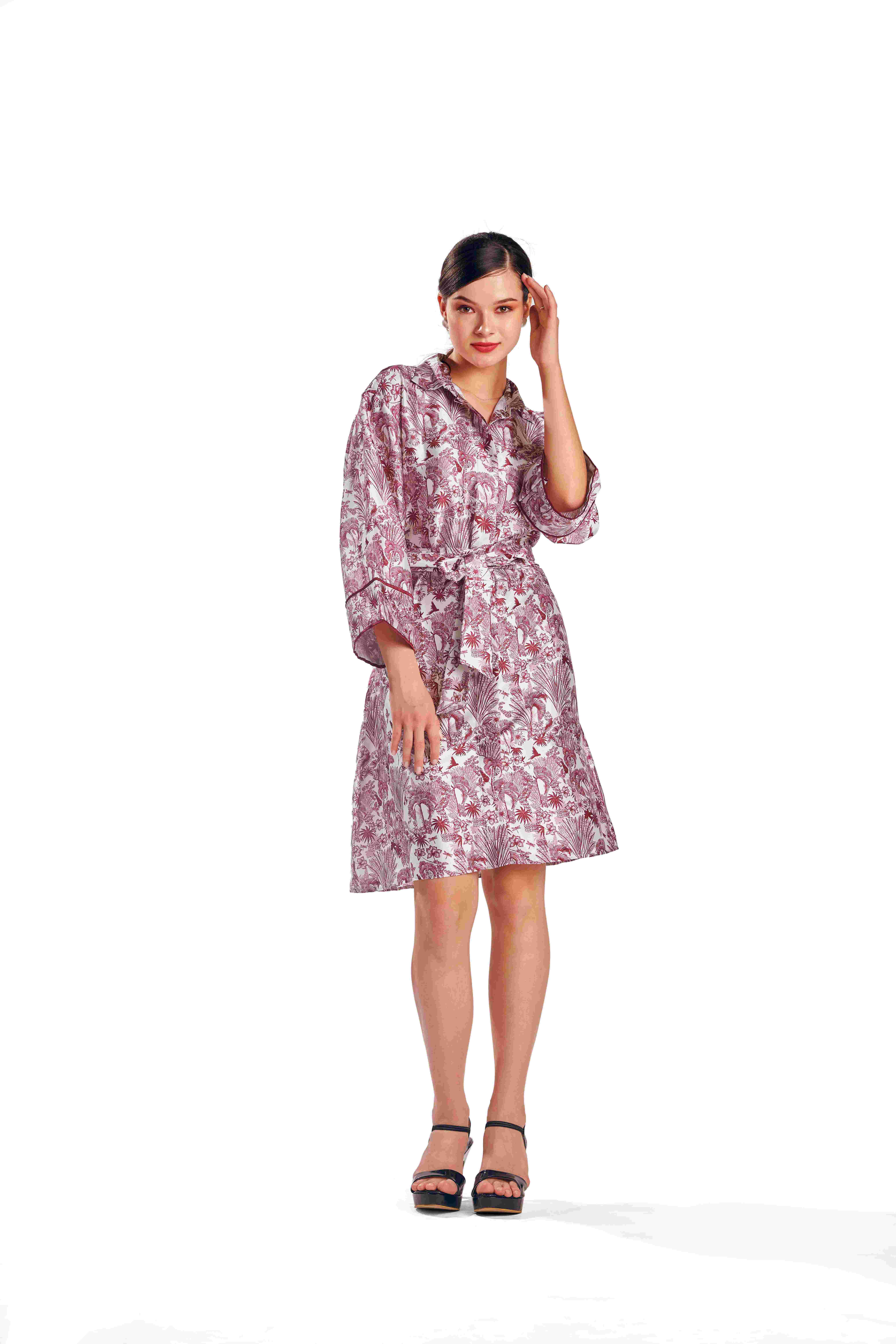 A model showcasing Alessia Printed Dress by Zilaire from Zilaire's collection