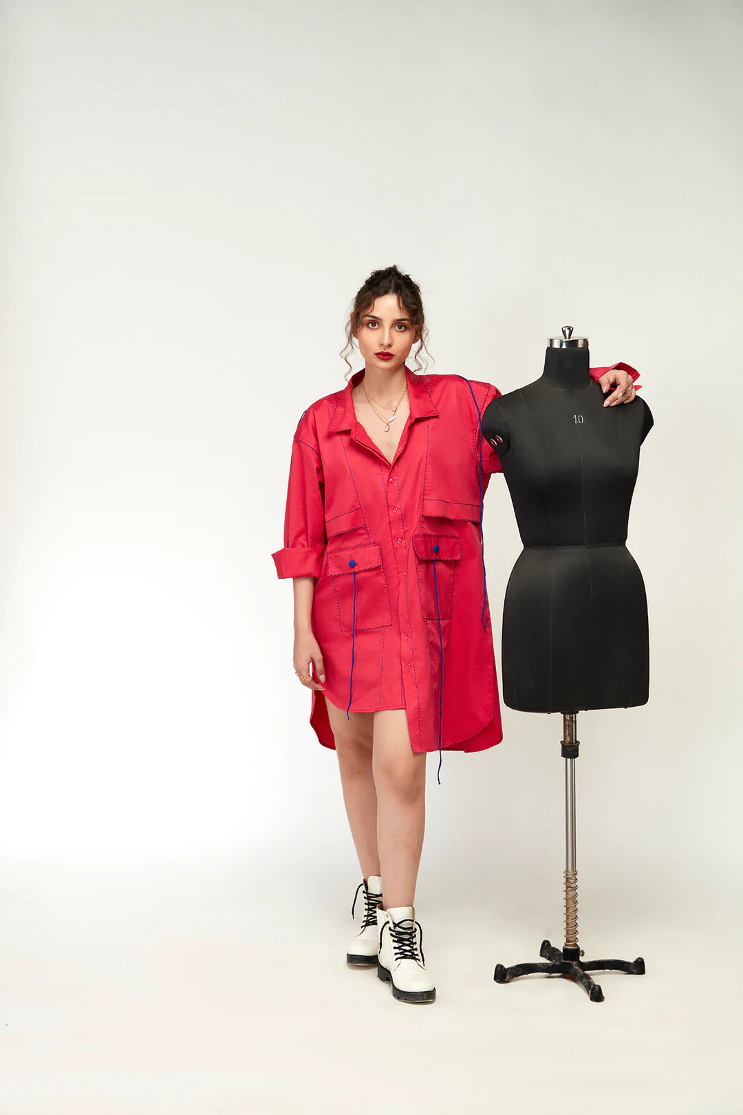 A model showcasing Berrylush Shirt Dress by Zilaire from Zilaire's collection