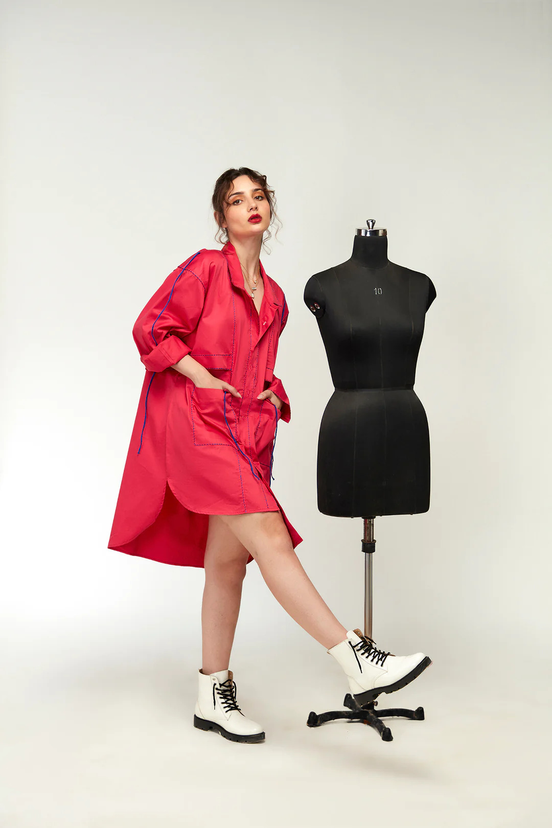 A model showcasing Berrylush Shirt Dress by Zilaire from Zilaire's collection