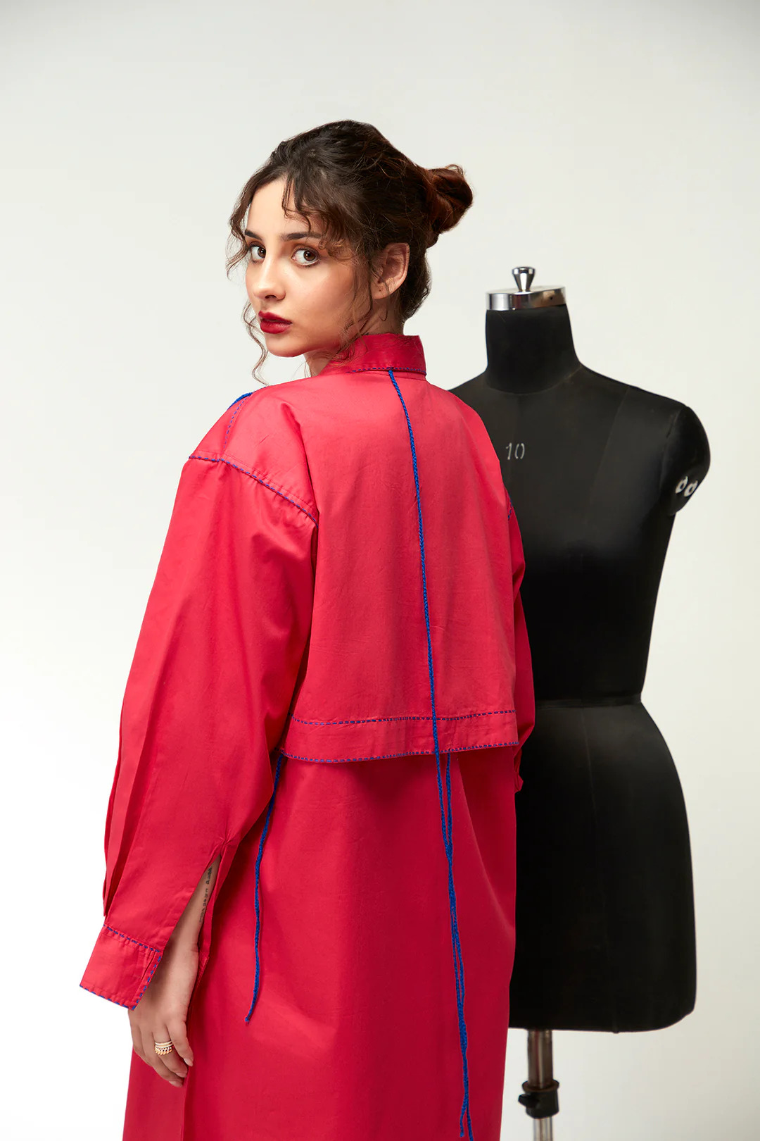 A model showcasing Berrylush Shirt Dress by Zilaire from Zilaire's collection