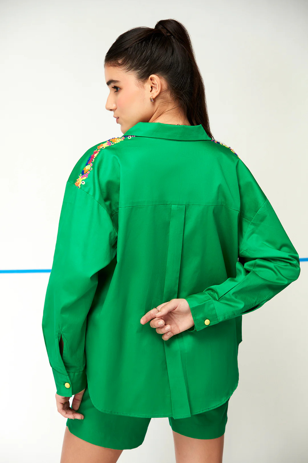 A model showcasing Boreal Green Coord Set by Zilaire from Zilaire's collection