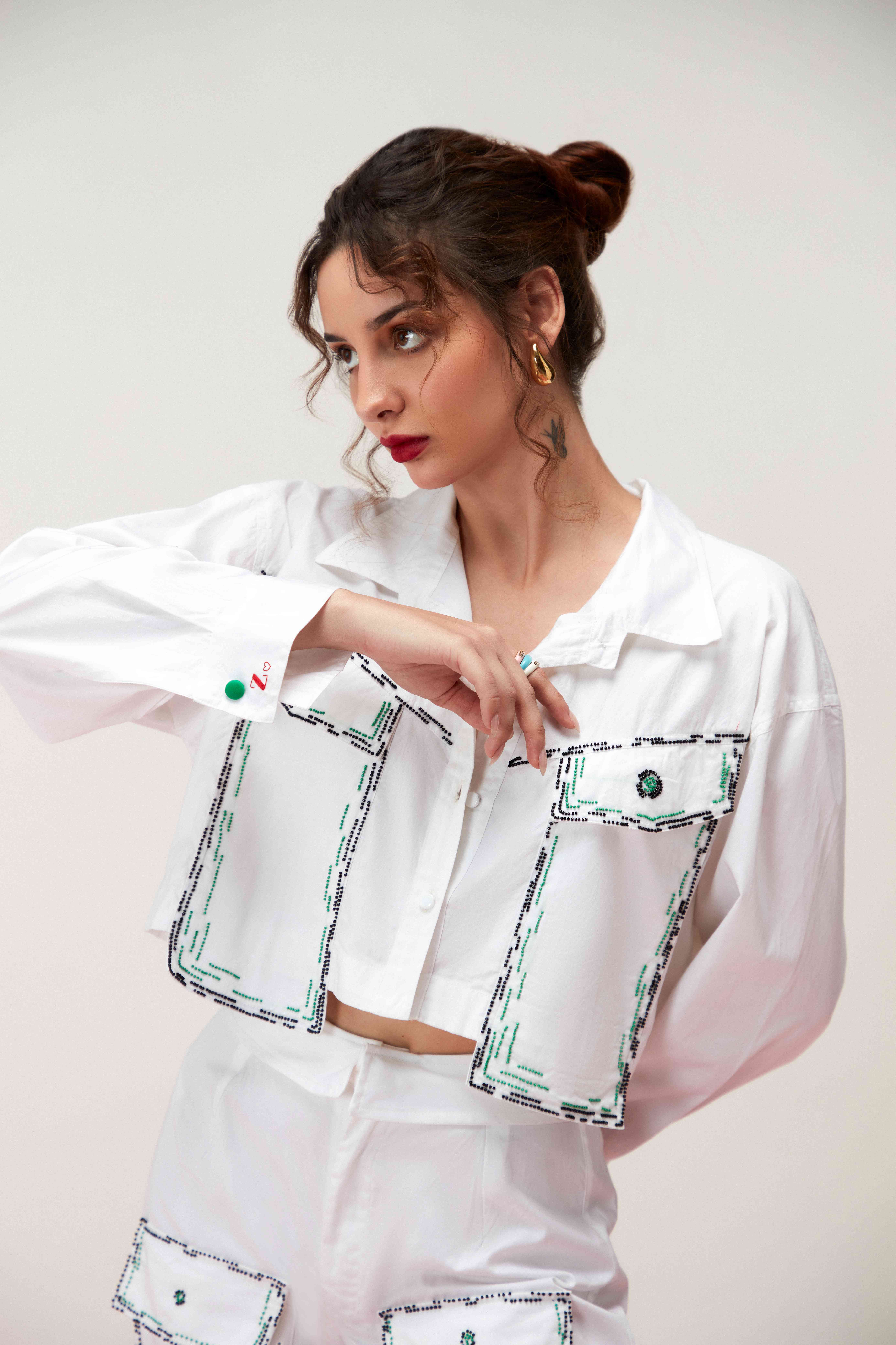 A model showcasing Blanc White Cargo Set by Zilaire from Zilaire's collection
