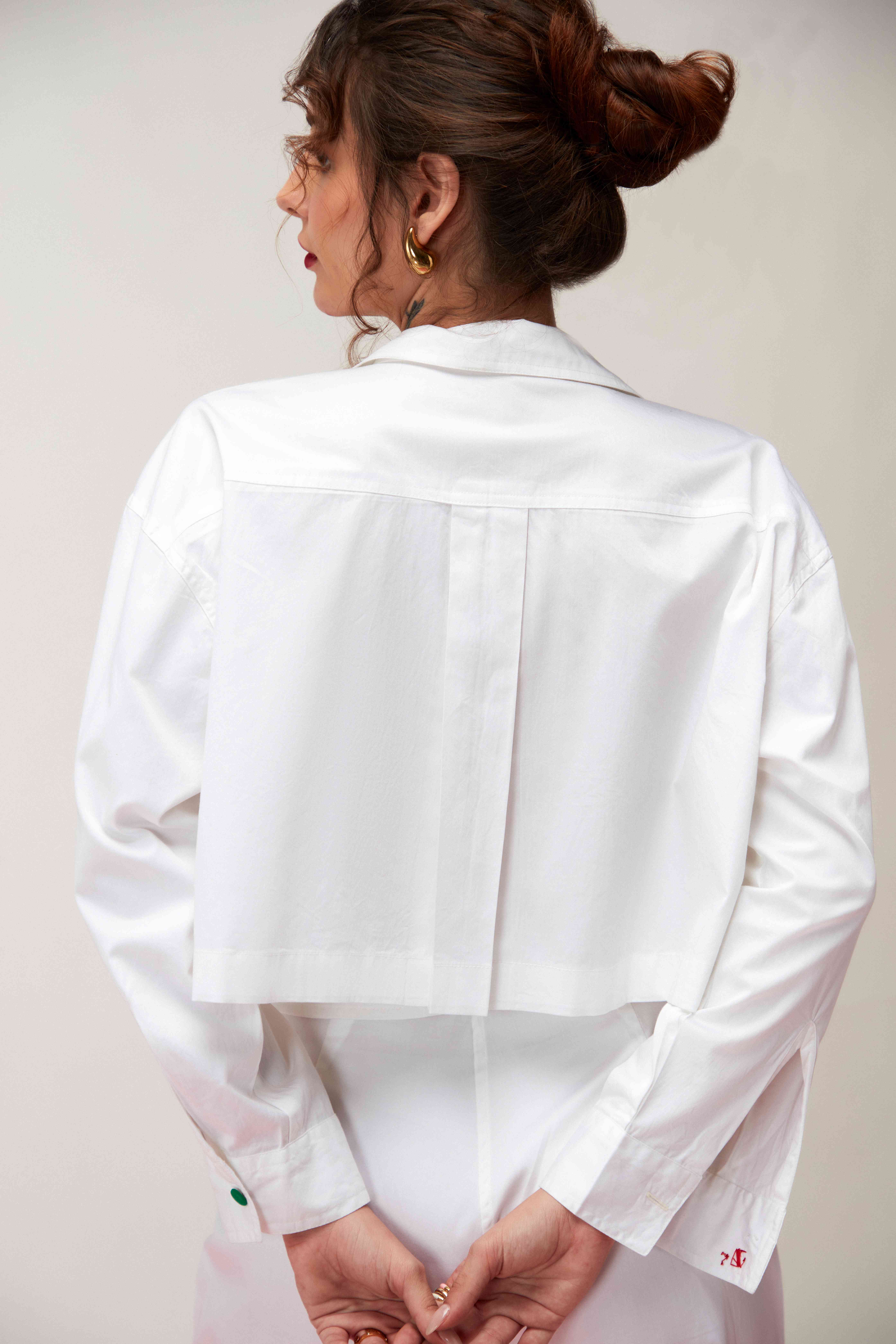A model showcasing Blanc White Cargo Set by Zilaire from Zilaire's collection