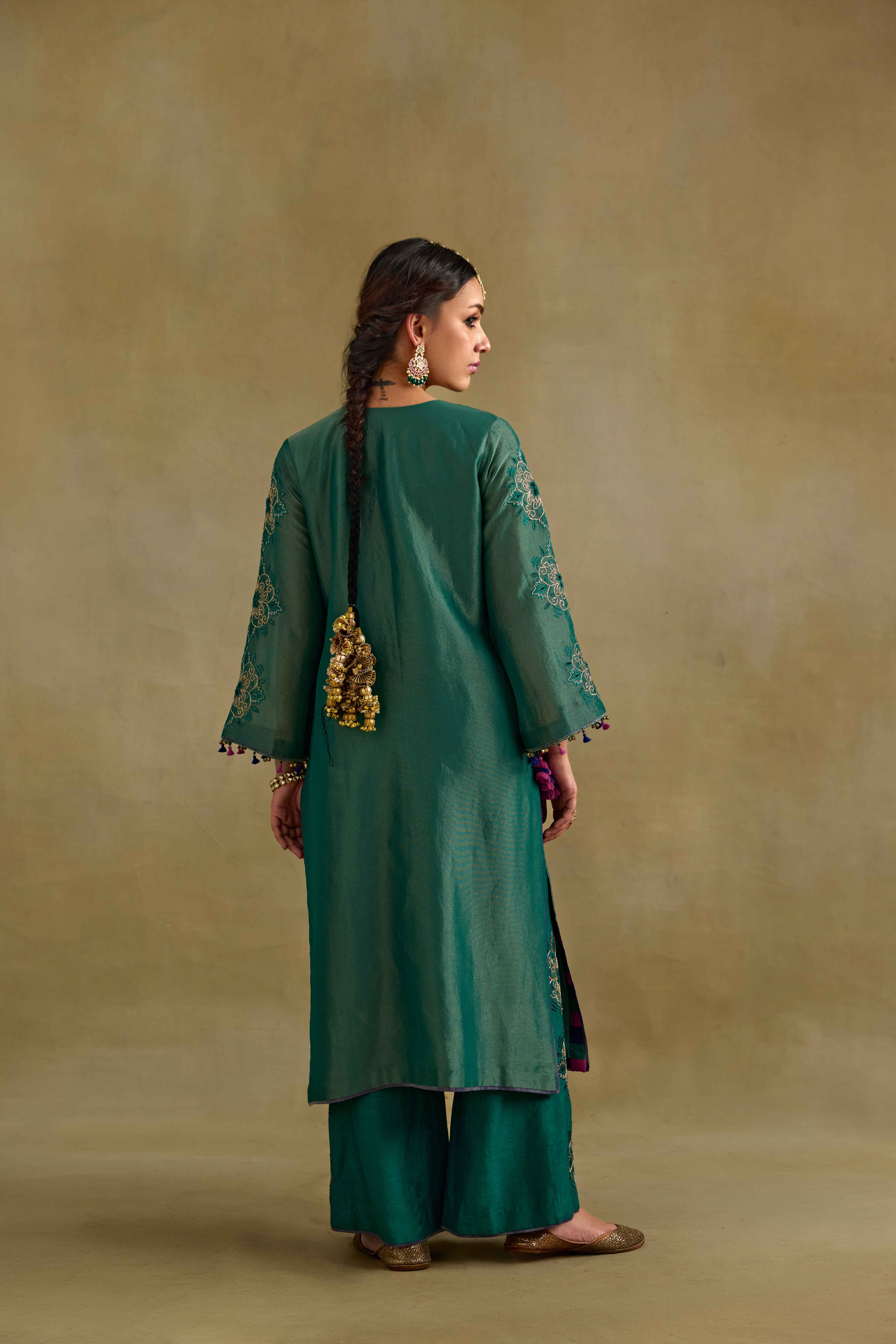A model showcasing Anam Green Kurta Set by Nirvair from Nirvair's collection