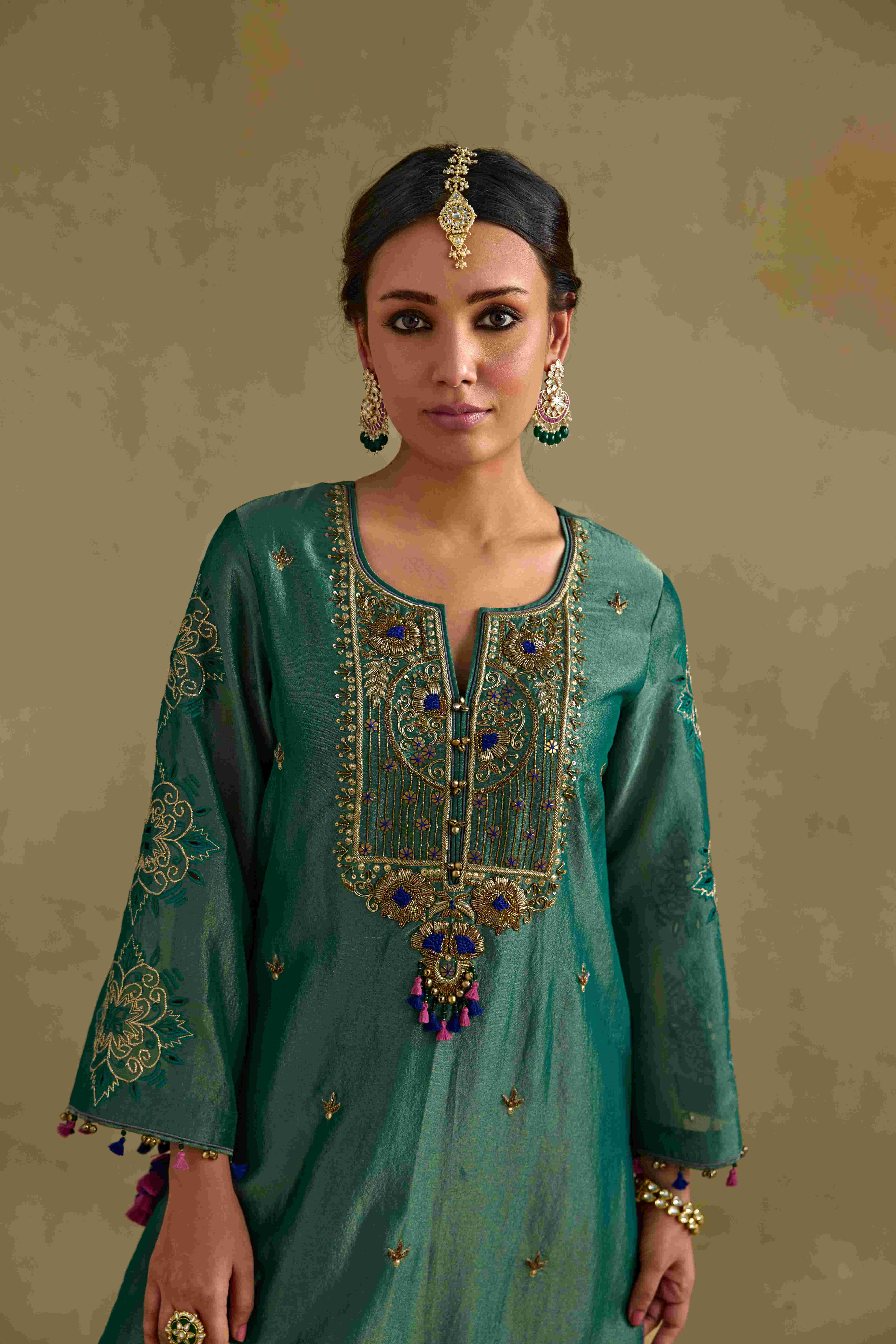 A model showcasing Anam Green Kurta Set by Nirvair from Nirvair's collection
