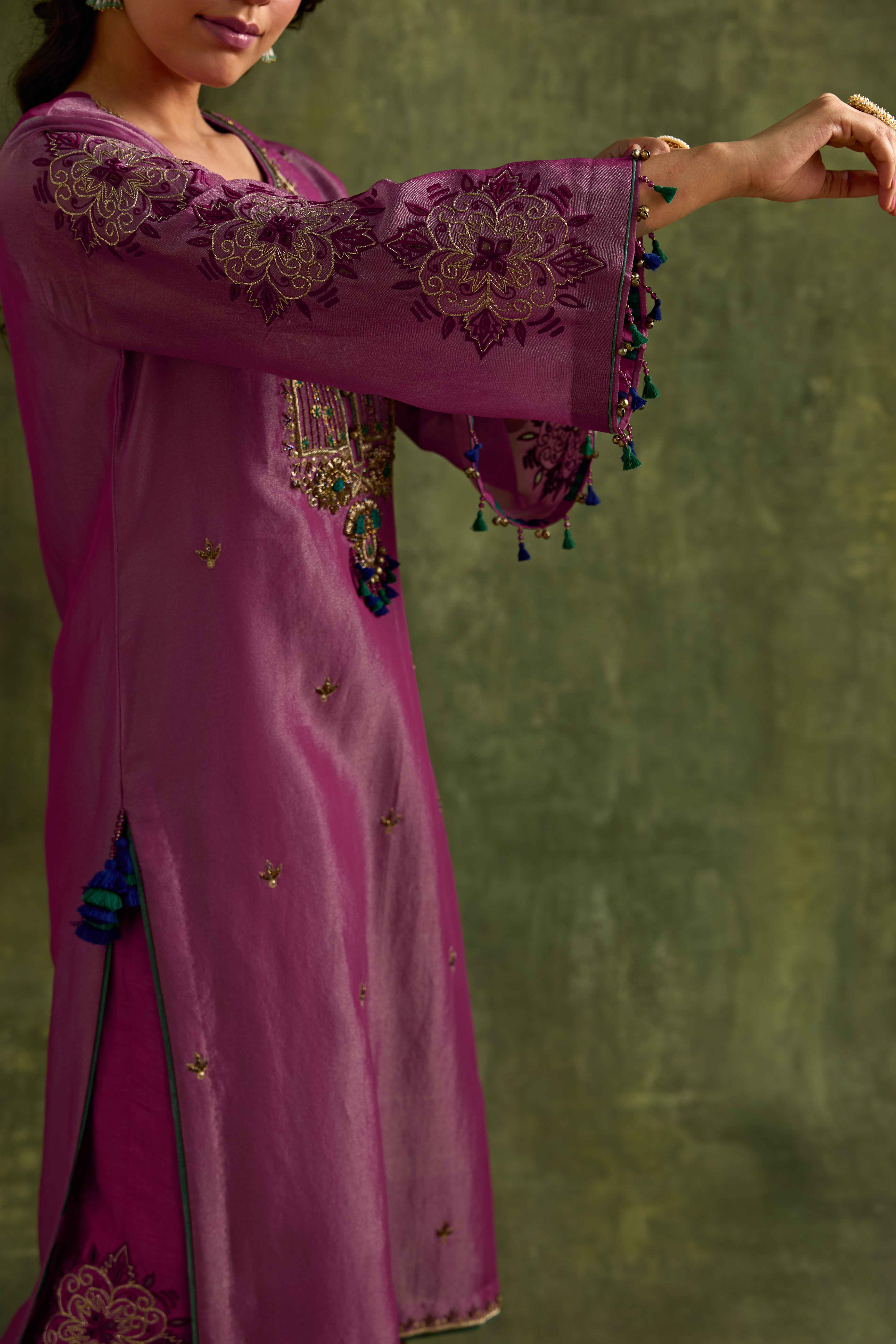 A model showcasing Anam Pink Tissue Kurta Set by Nirvair from Nirvair's collection