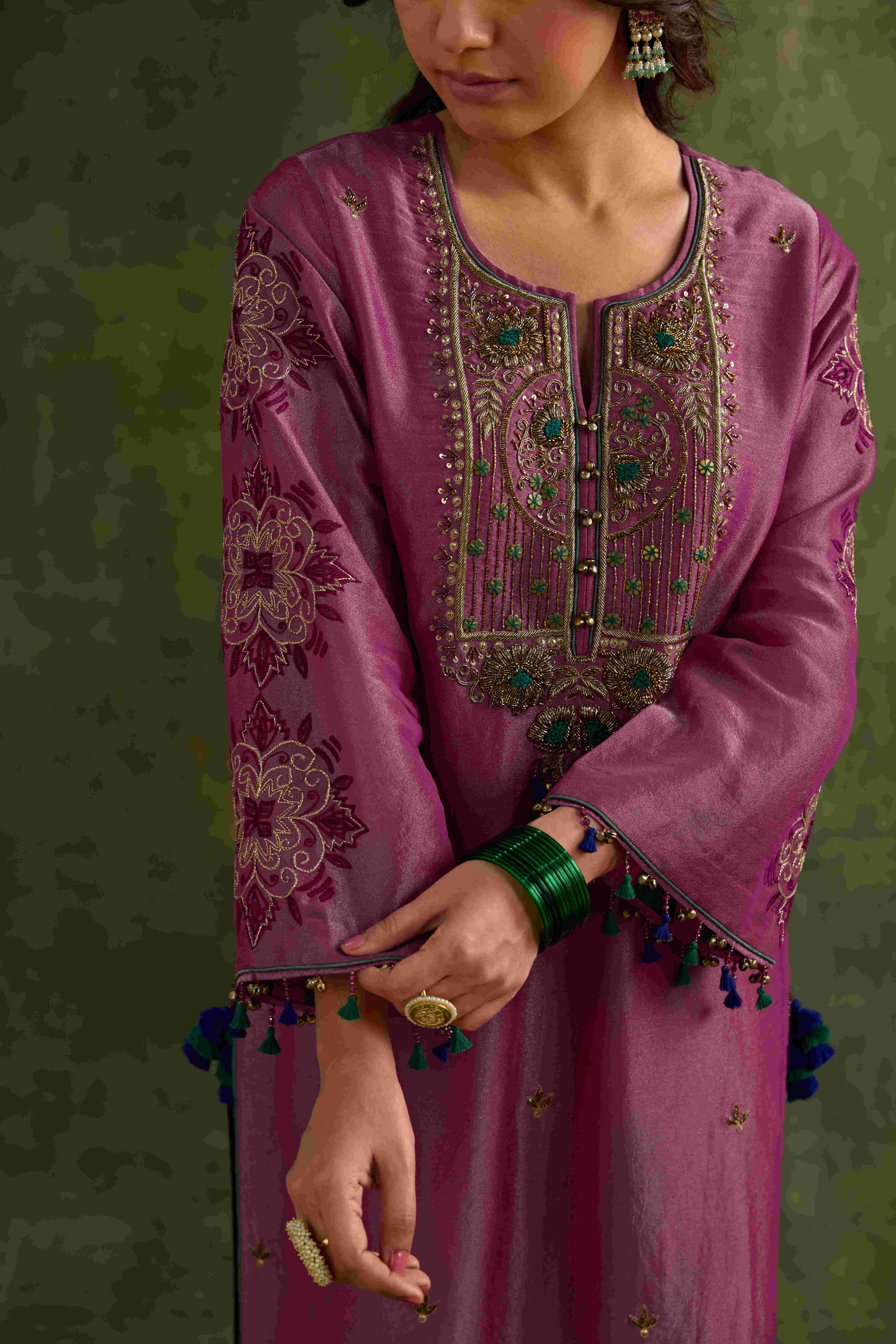 A model showcasing Anam Pink Tissue Kurta Set by Nirvair from Nirvair's collection