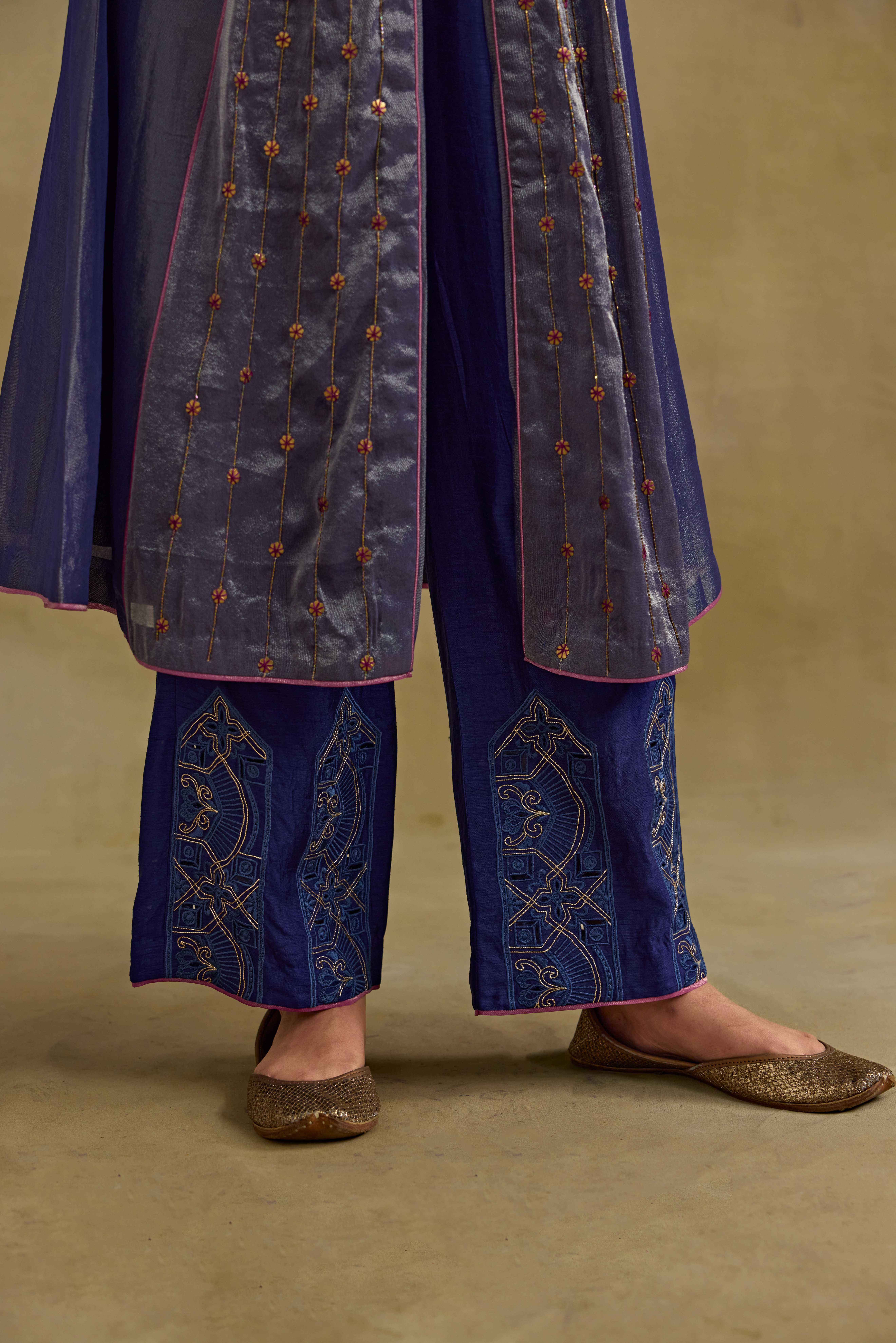 A model showcasing Hasrat Kalidar Blue Suit Set by Nirvair from Nirvair's collection