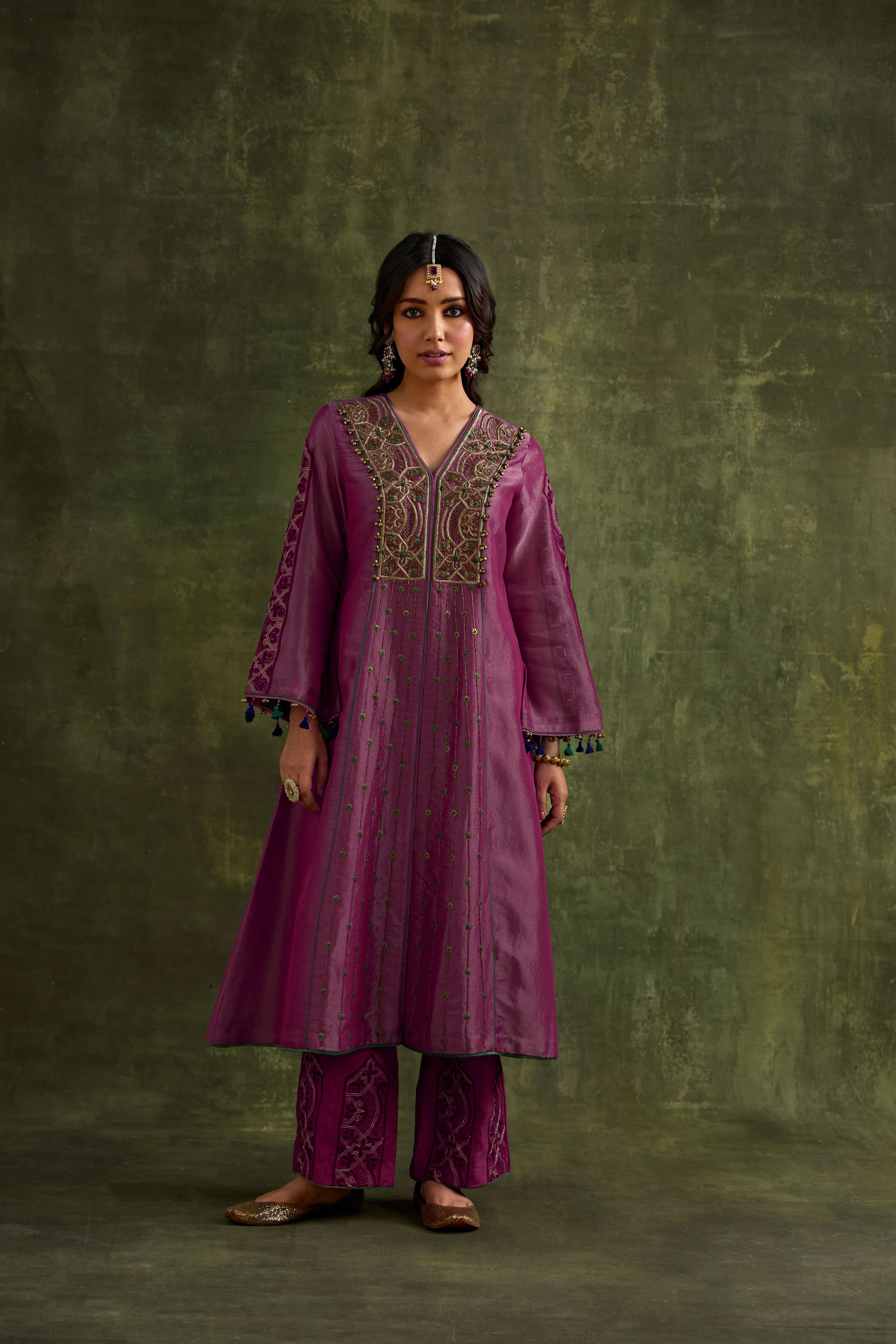 A model showcasing Hasrat Kalidar Tissue Suit Set by Nirvair from Nirvair's collection