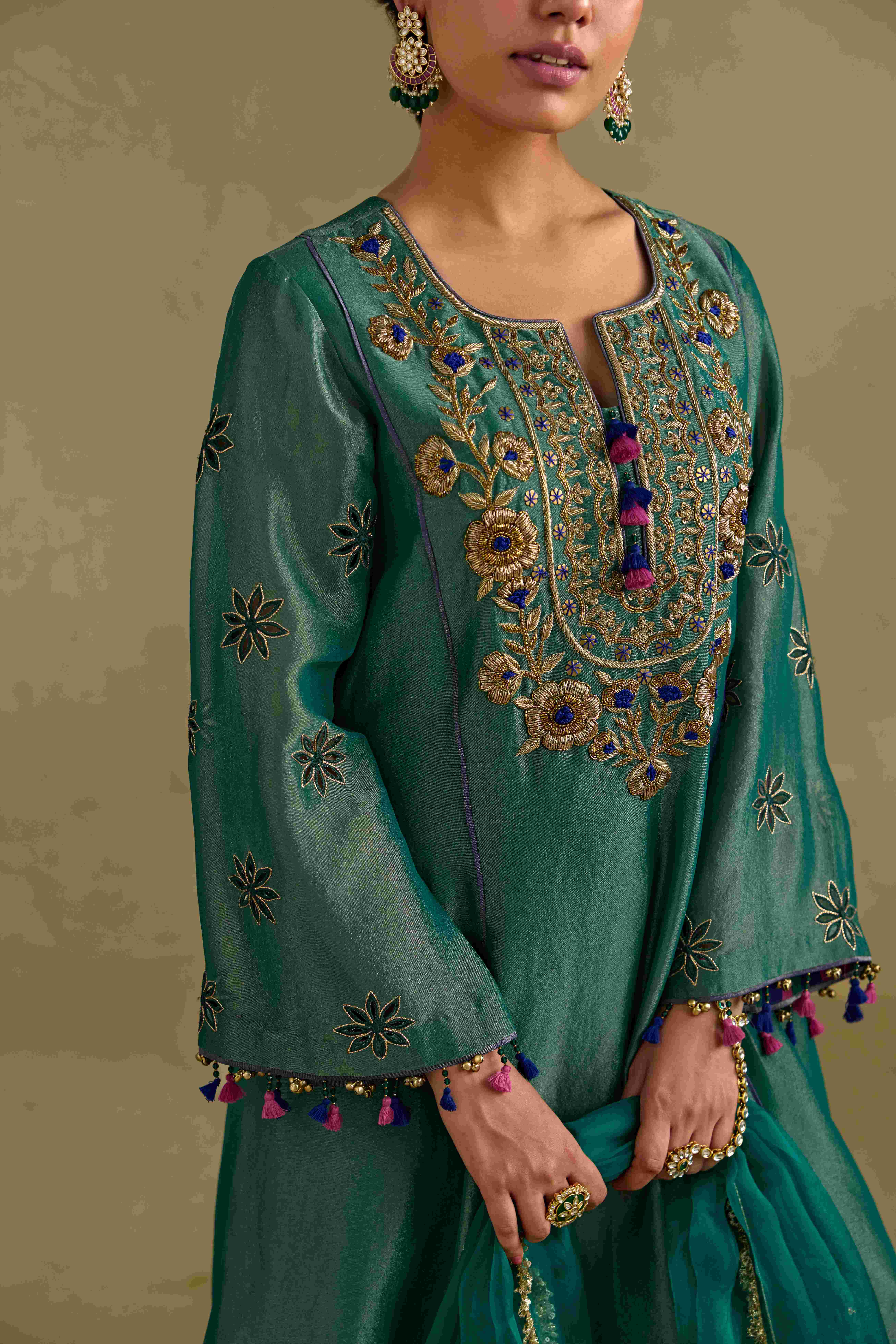 A model showcasing Eknoor A Line Tissue Kurta Set by Nirvair from Nirvair's collection