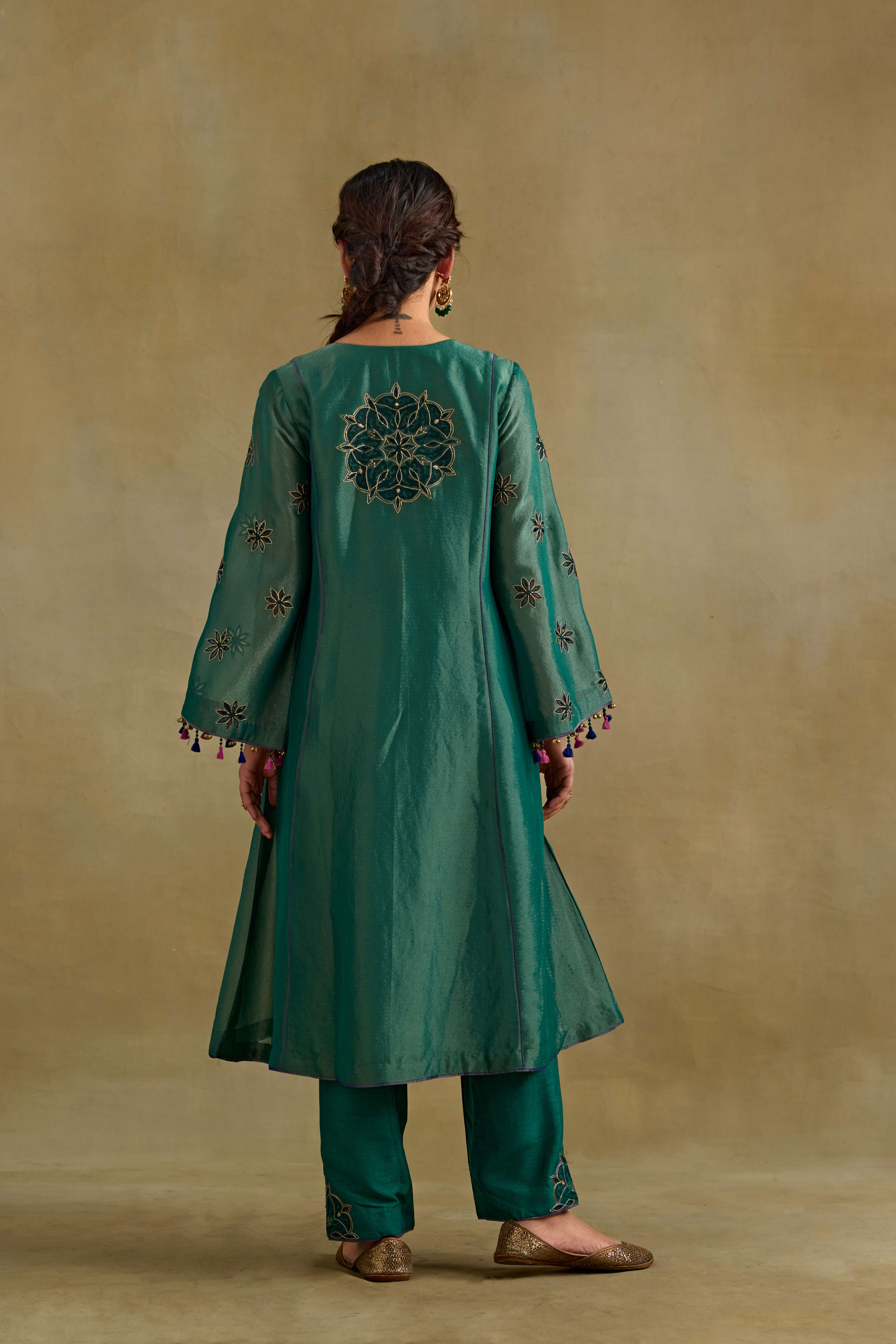 A model showcasing Eknoor A Line Tissue Kurta Set by Nirvair from Nirvair's collection