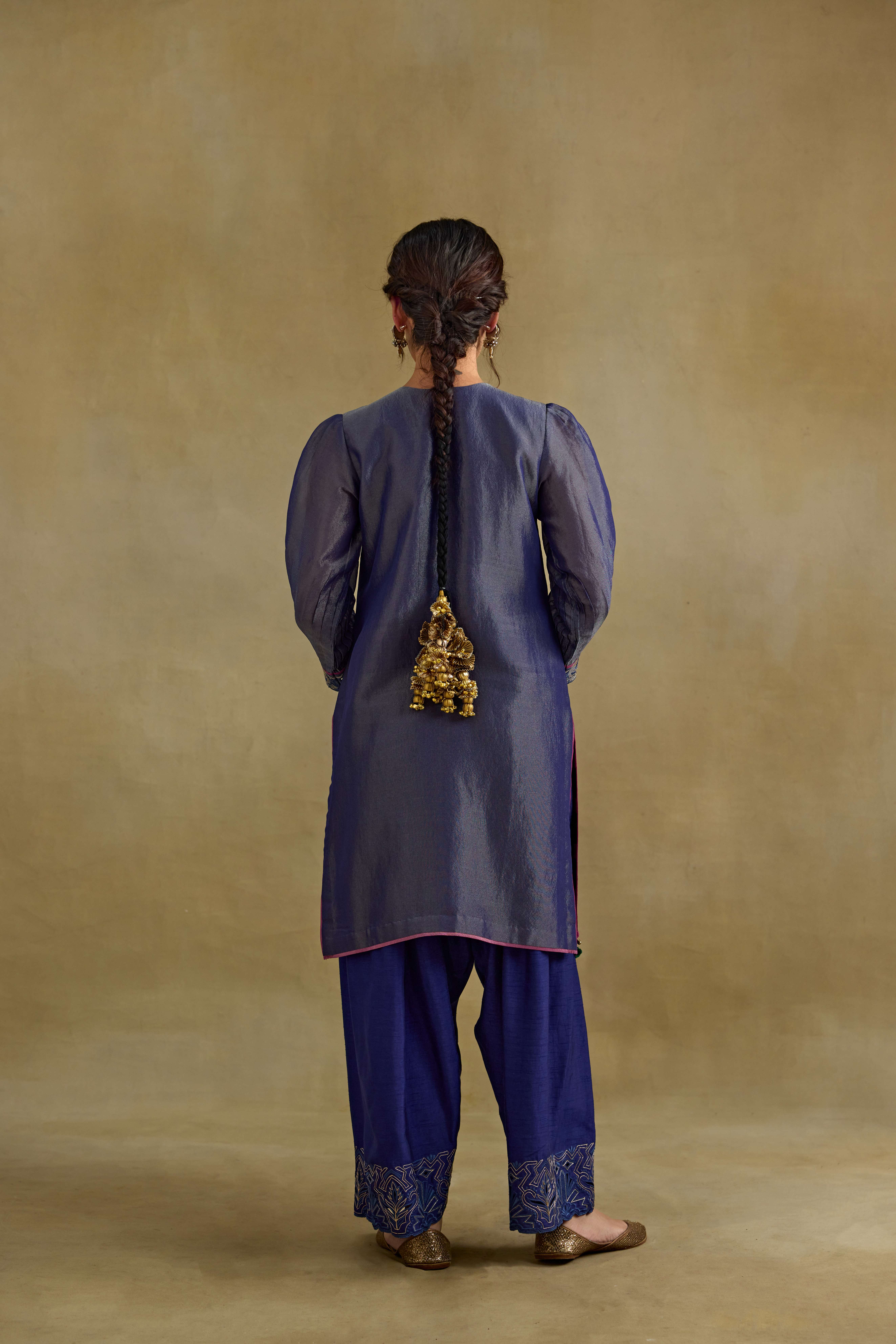 A model showcasing Heer Blue Short Kurta Salwar Set by Nirvair from Nirvair's collection