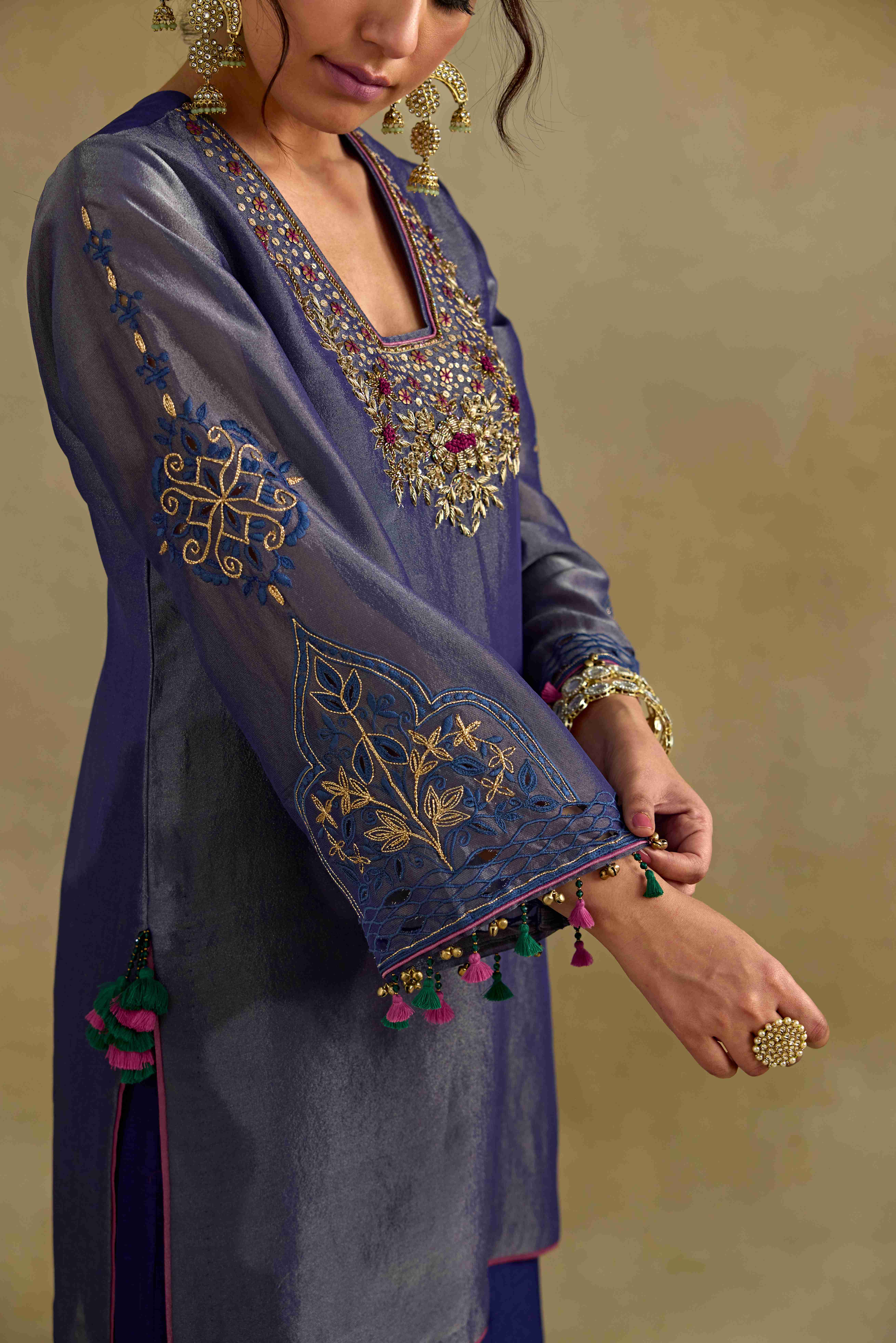 A model showcasing Prisha Short Kurta Garara Set by Nirvair from Nirvair's collection