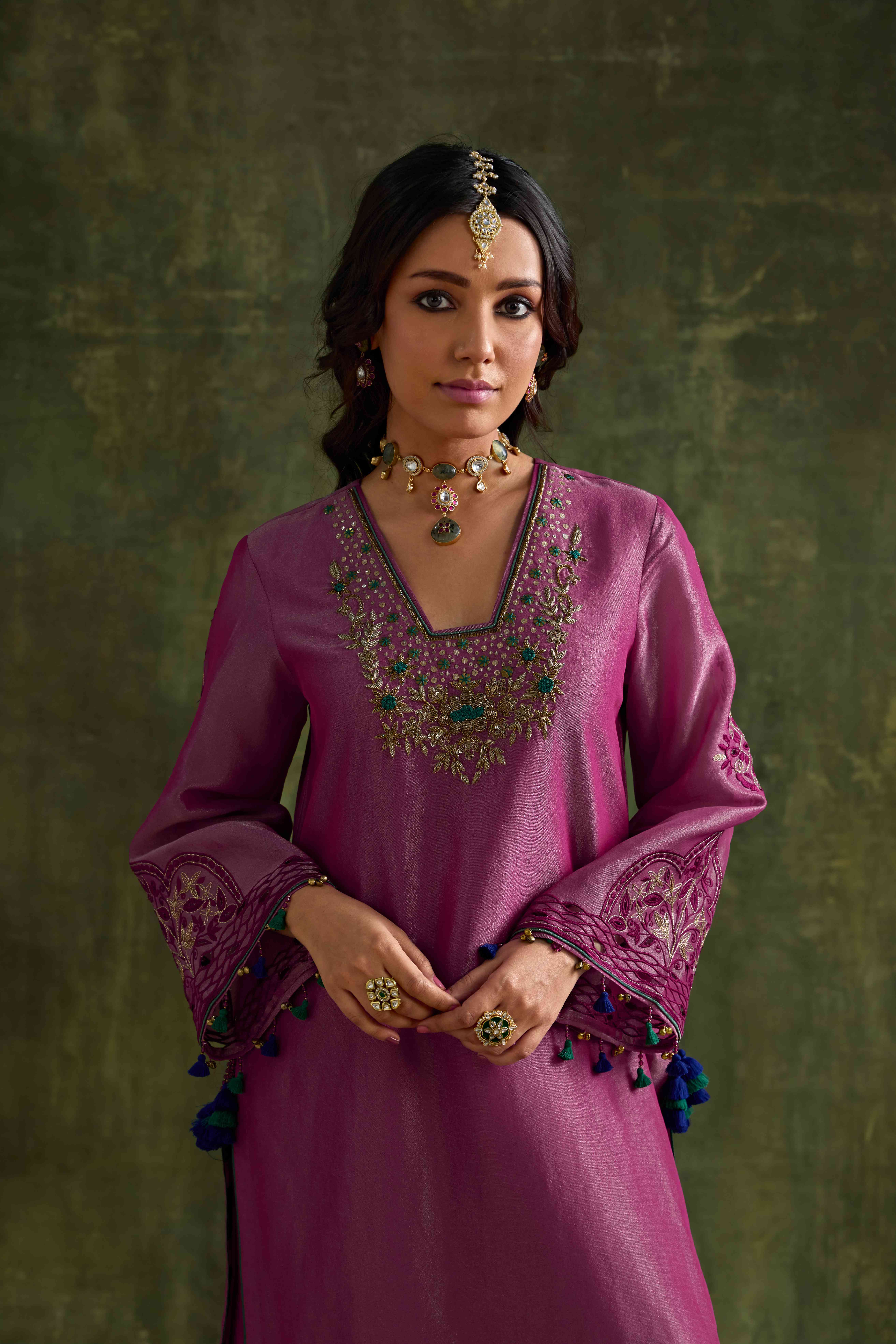 A model showcasing Prisha Pink Short Kurta Garara Set by Nirvair from Nirvair's collection