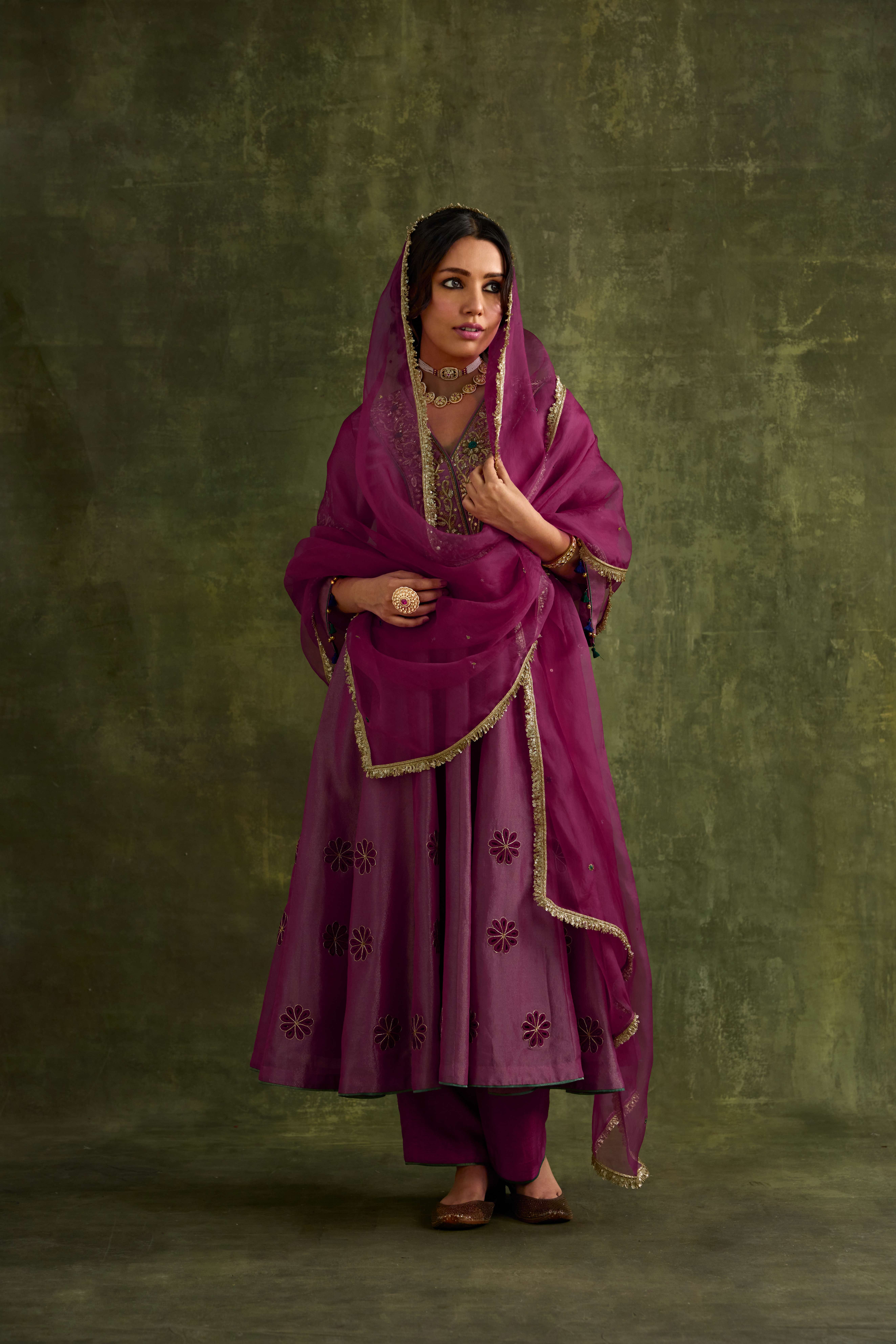A model showcasing Amreen Tissue Anarkali Kurta Set by Nirvair from Nirvair's collection
