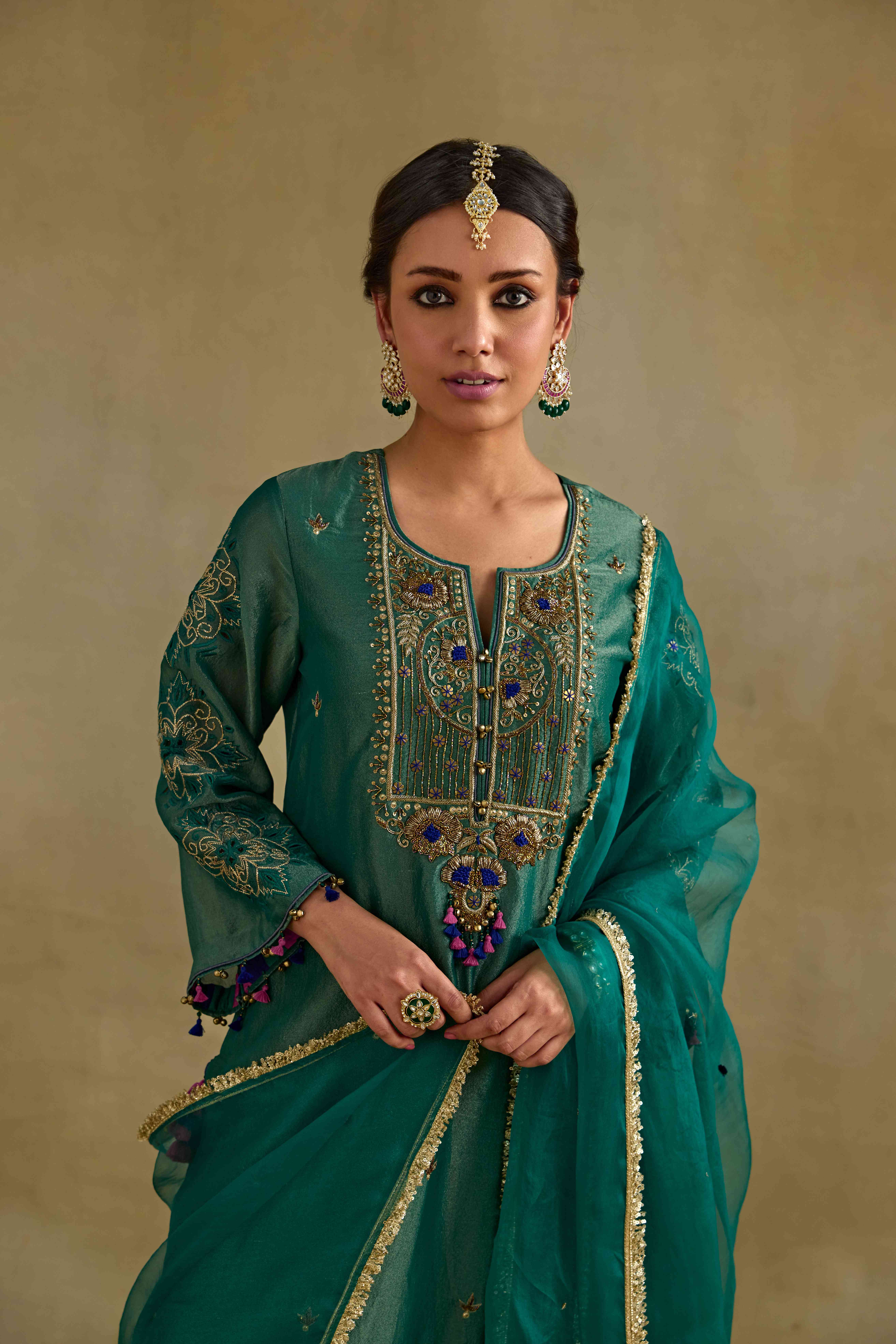 A model showcasing Anam Green Dupatta by Nirvair from Nirvair's collection A model showcasing Anam Green Dupatta by Nirvair from Nirvair's collection