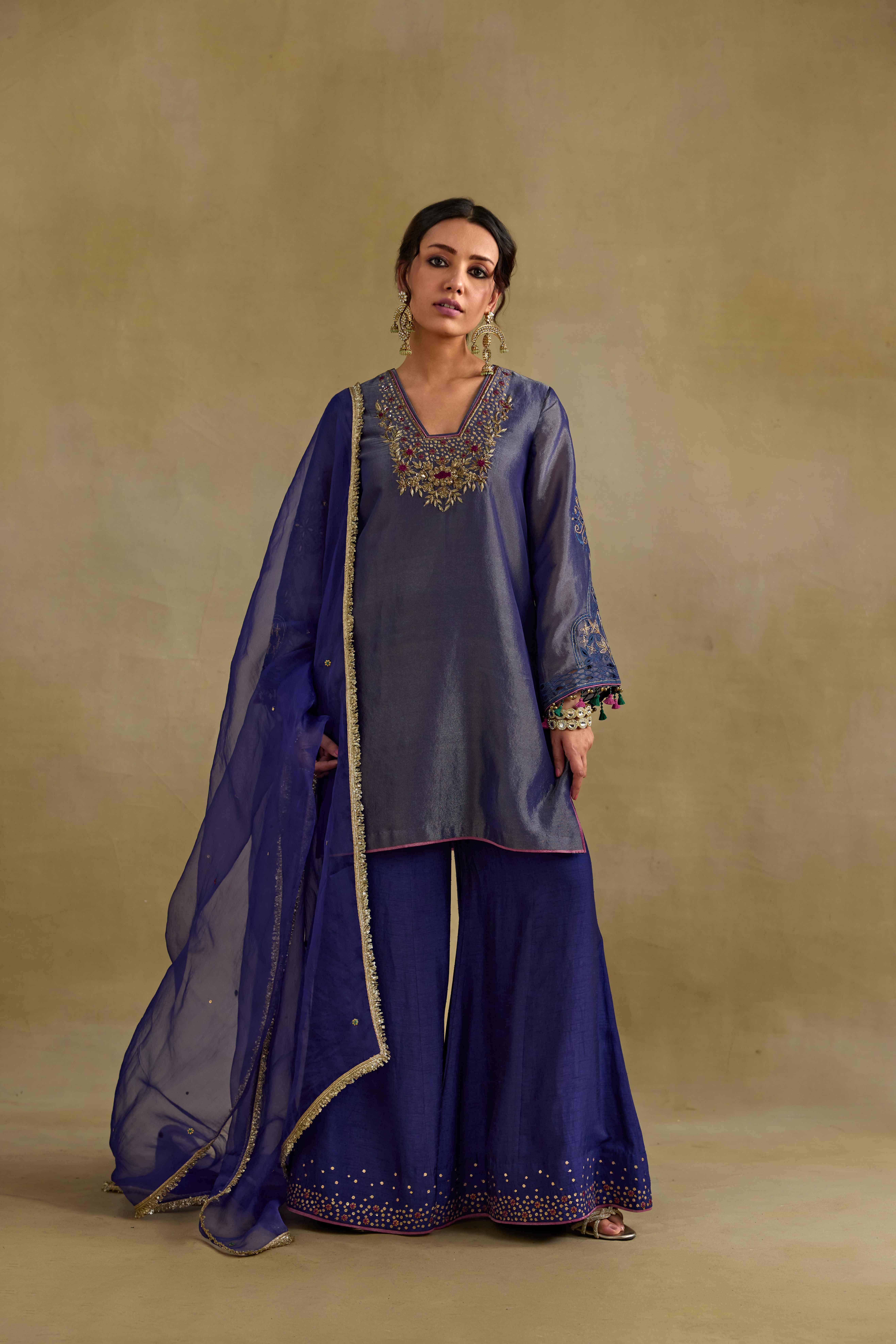 A model showcasing Prisha Blue Dupatta by Nirvair from Nirvair's collection A model showcasing Prisha Blue Dupatta by Nirvair from Nirvair's collection