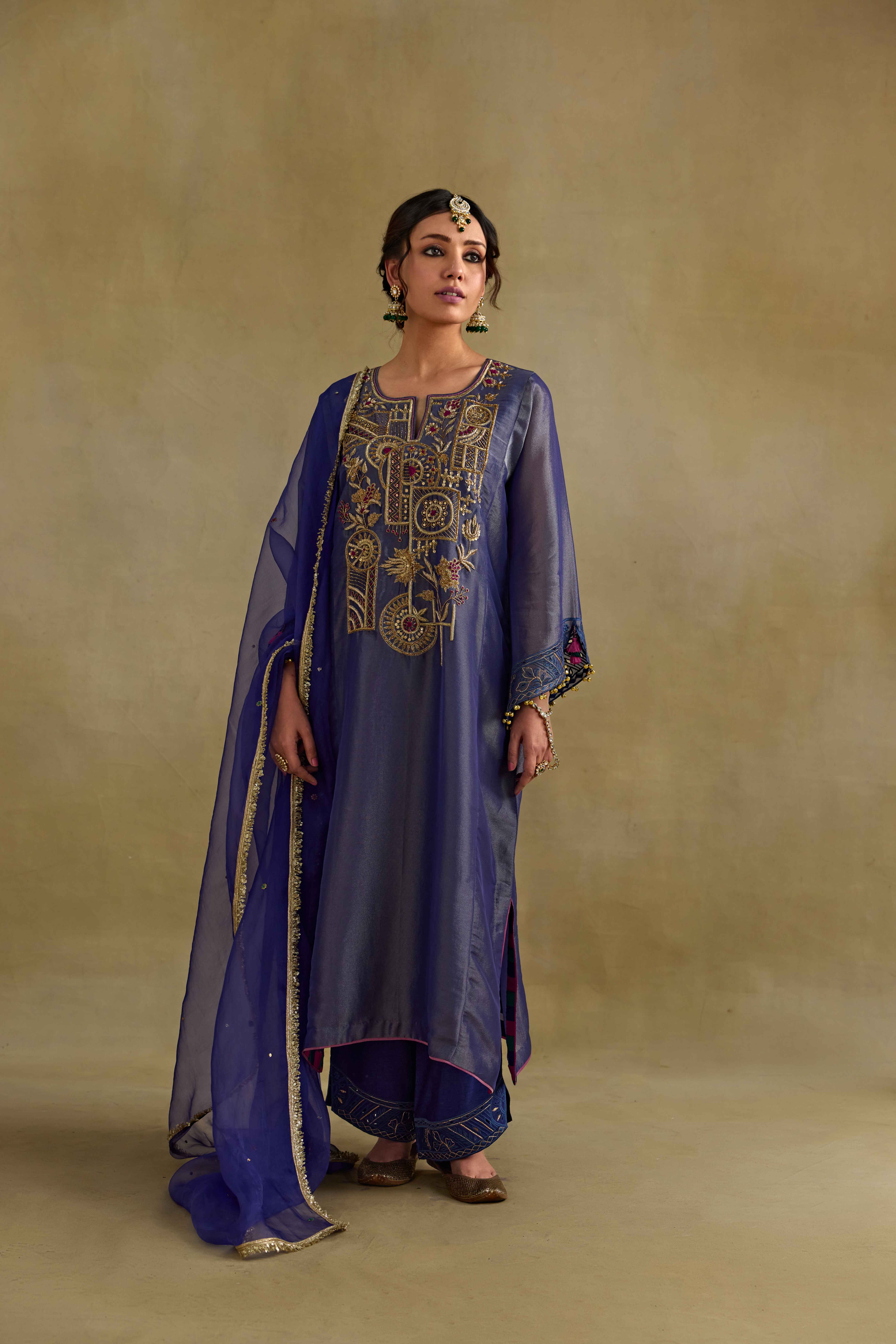 A model showcasing Amber Blue Dupatta by Nirvair from Nirvair's collection A model showcasing Amber Blue Dupatta by Nirvair from Nirvair's collection