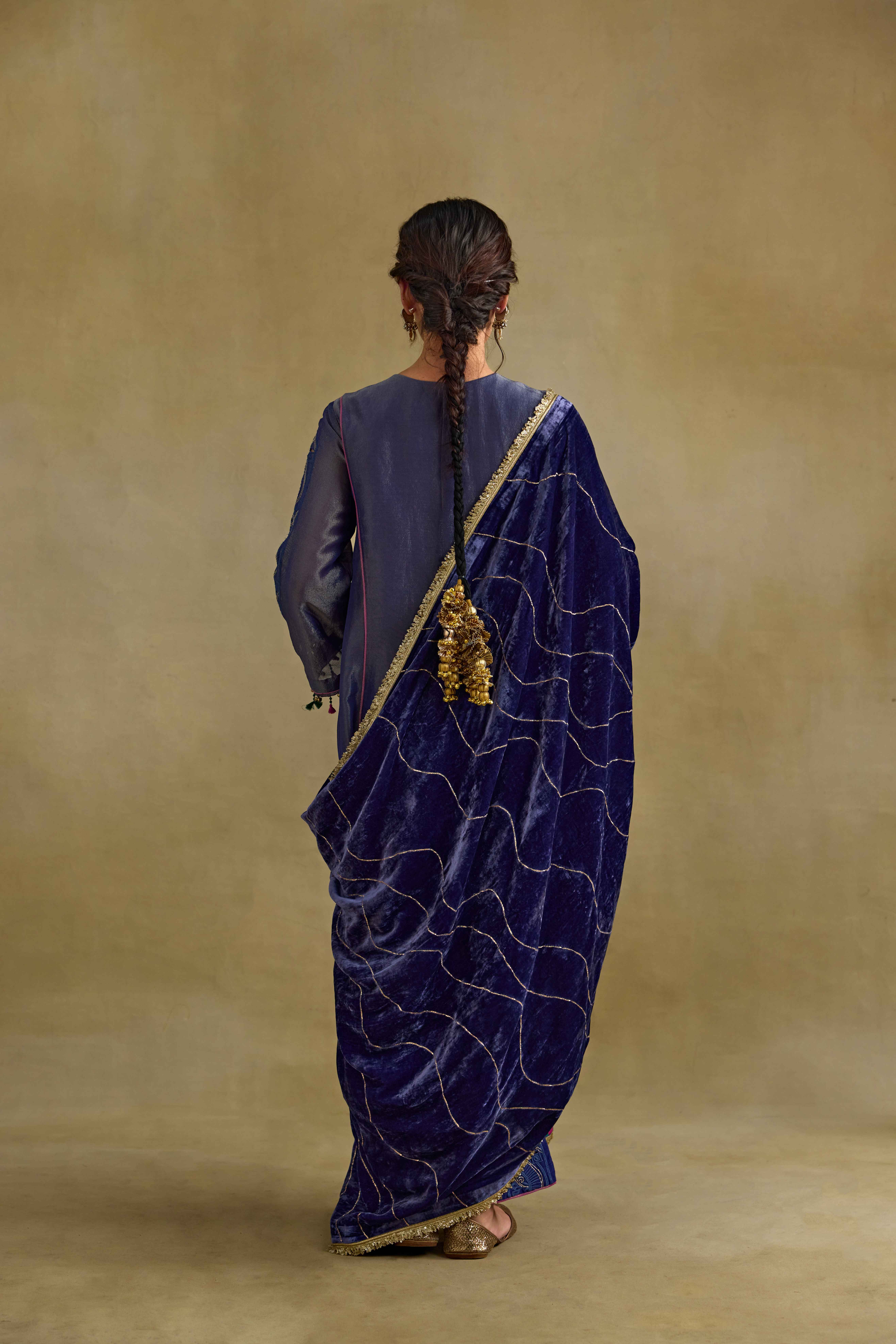 A model showcasing Hasrat Blue Doshala by Nirvair from Nirvair's collection A model showcasing Hasrat Blue Doshala by Nirvair from Nirvair's collection