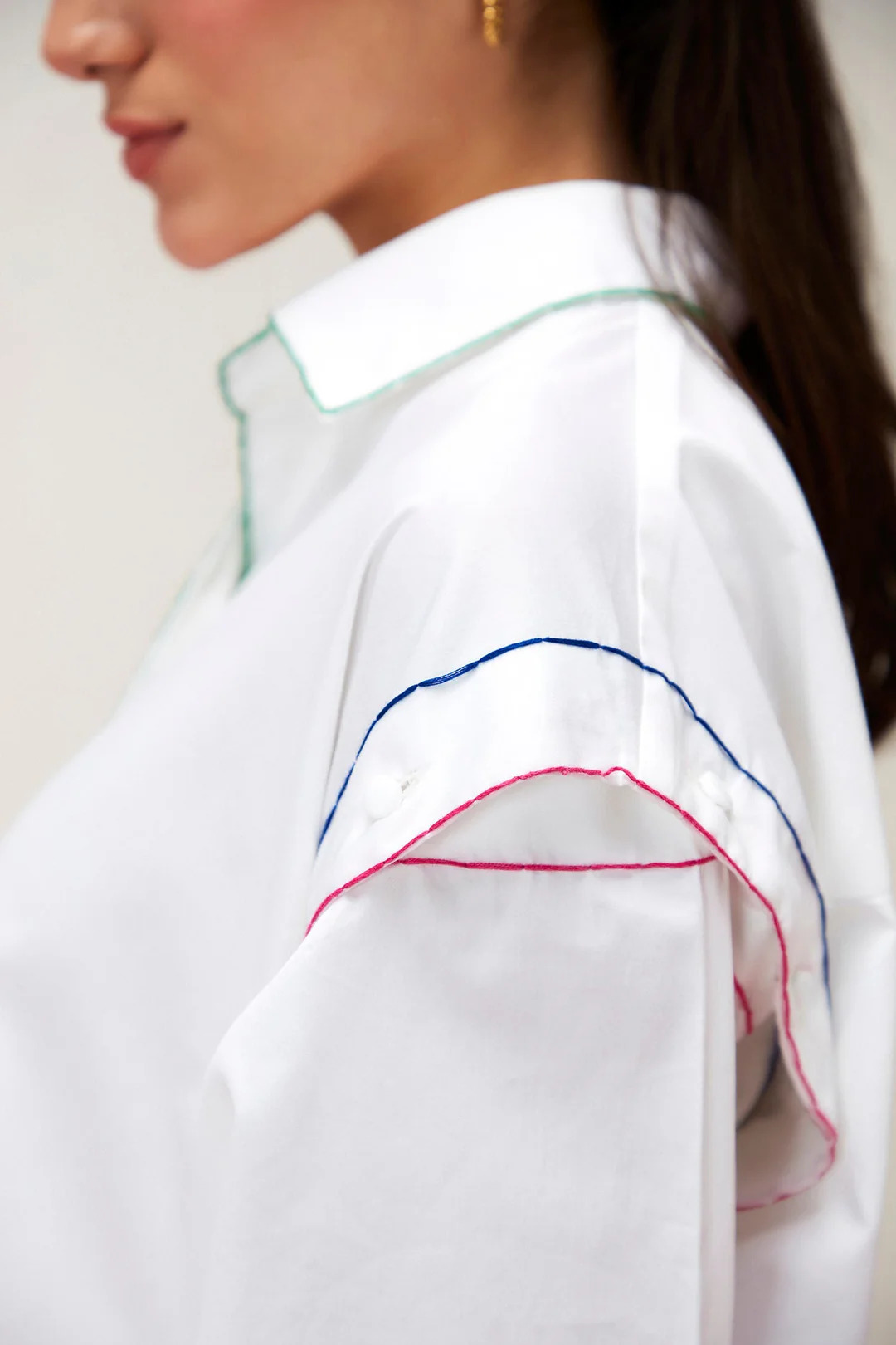 A model showcasing Bleach Surge Coord Set by Zilaire from Zilaire's collection