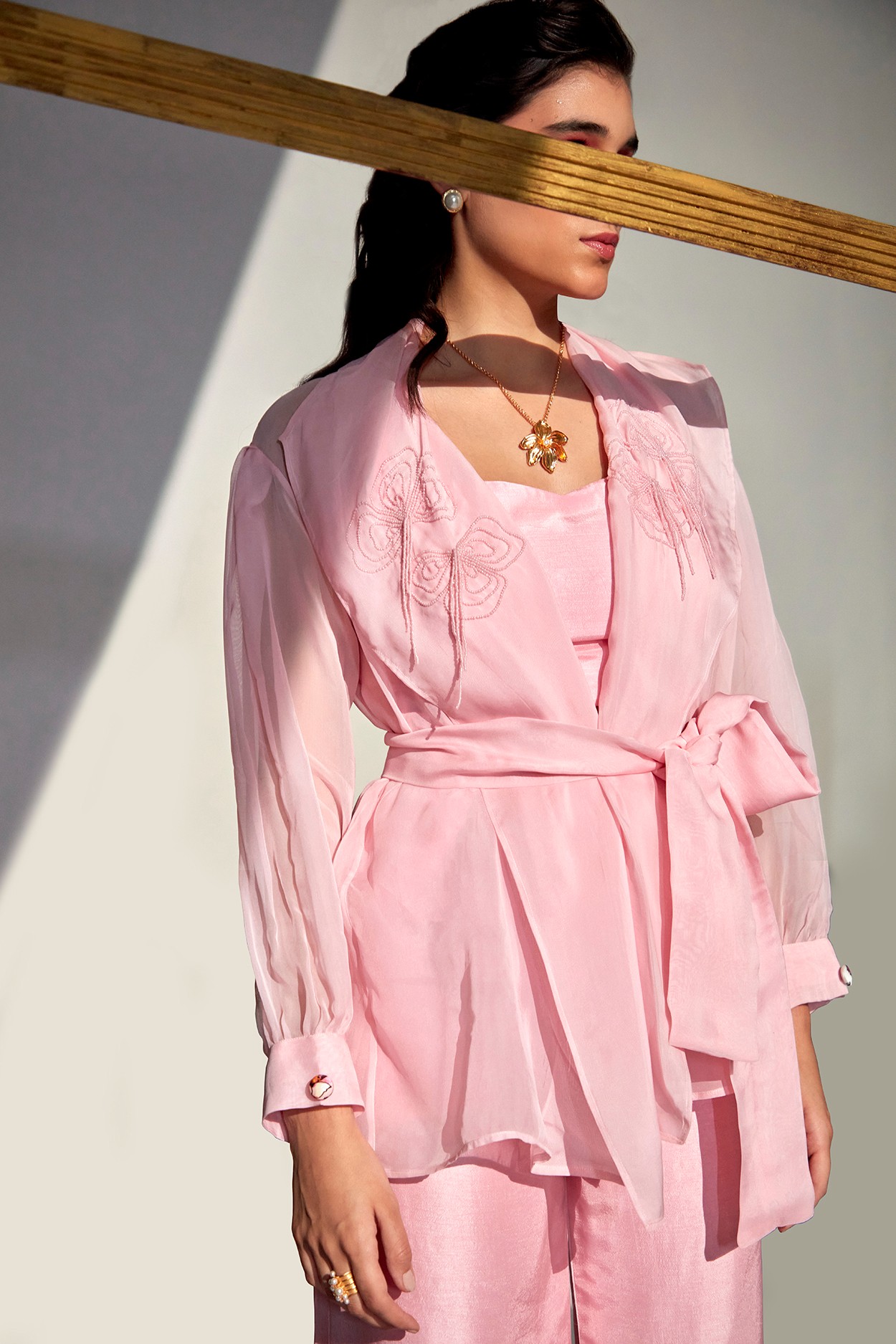 A model showcasing Mirage Organza Blazer Set by Zilaire from Zilaire's collection