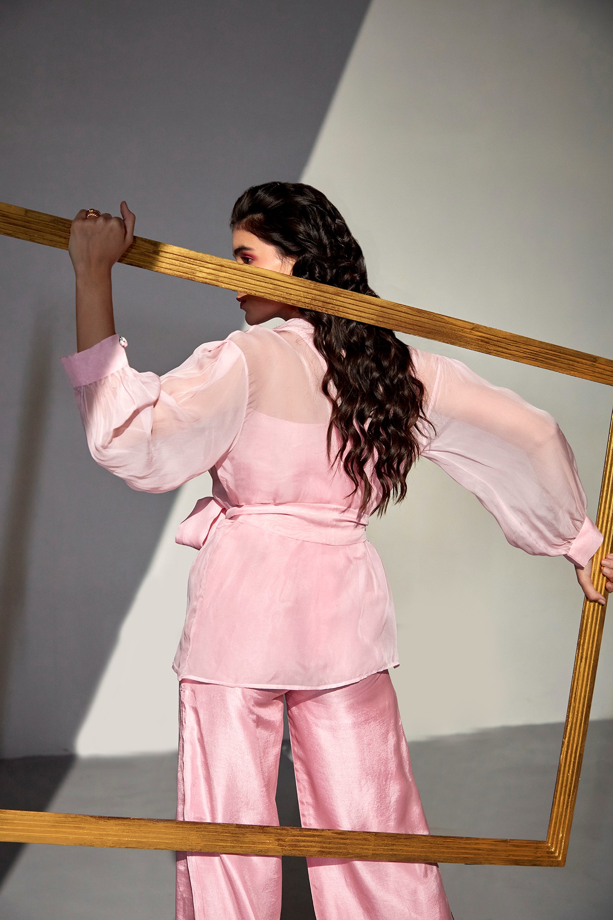 A model showcasing Mirage Organza Blazer Set by Zilaire from Zilaire's collection