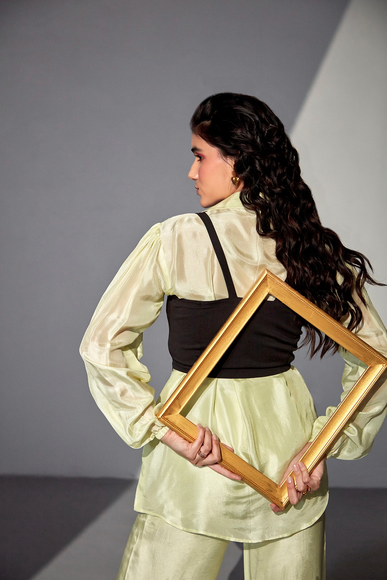 A model showcasing Melange Leme Green Coord Set by Zilaire from Zilaire's collection
