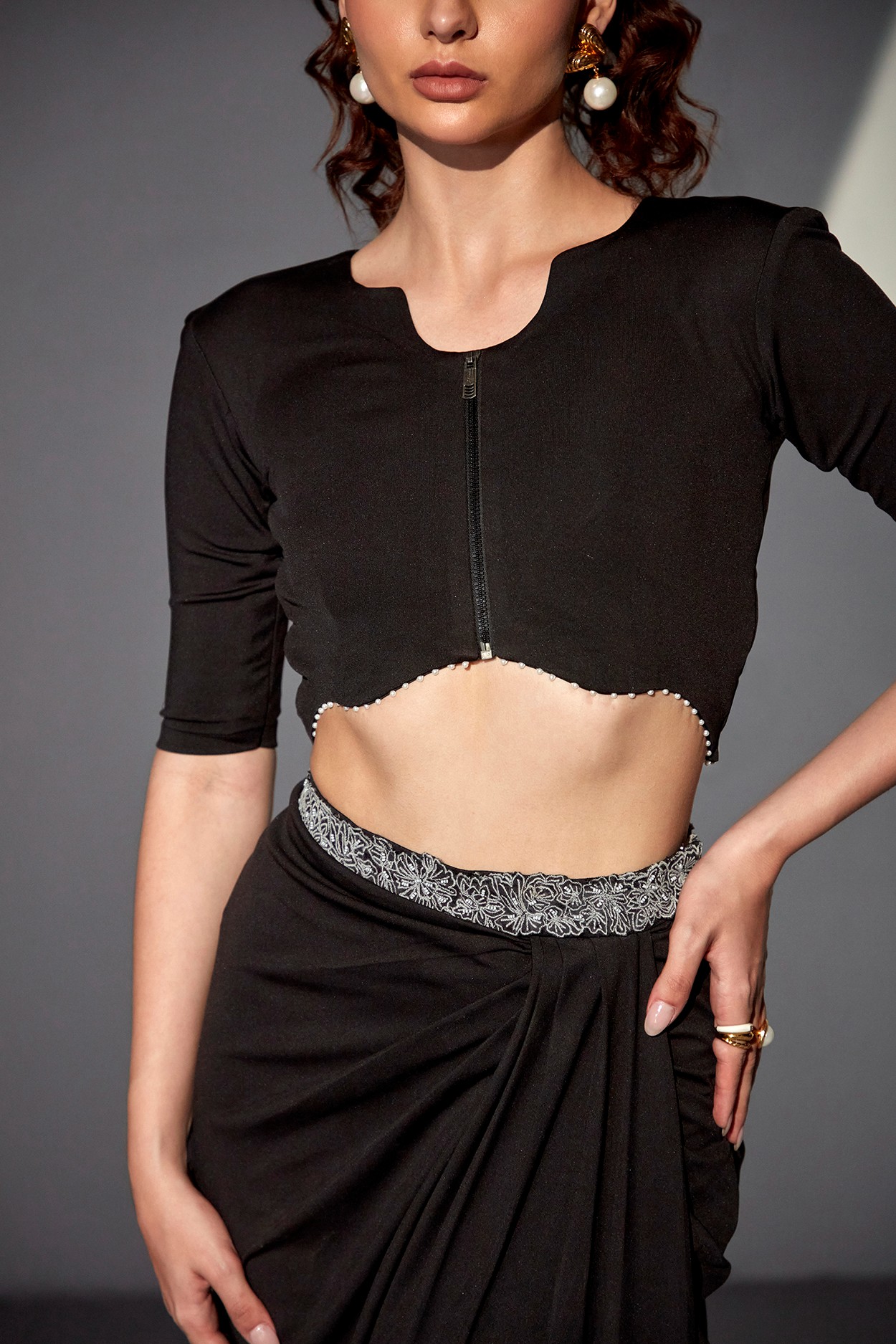A model showcasing Midnight Meadow Black Set by Zilaire from Zilaire's collection