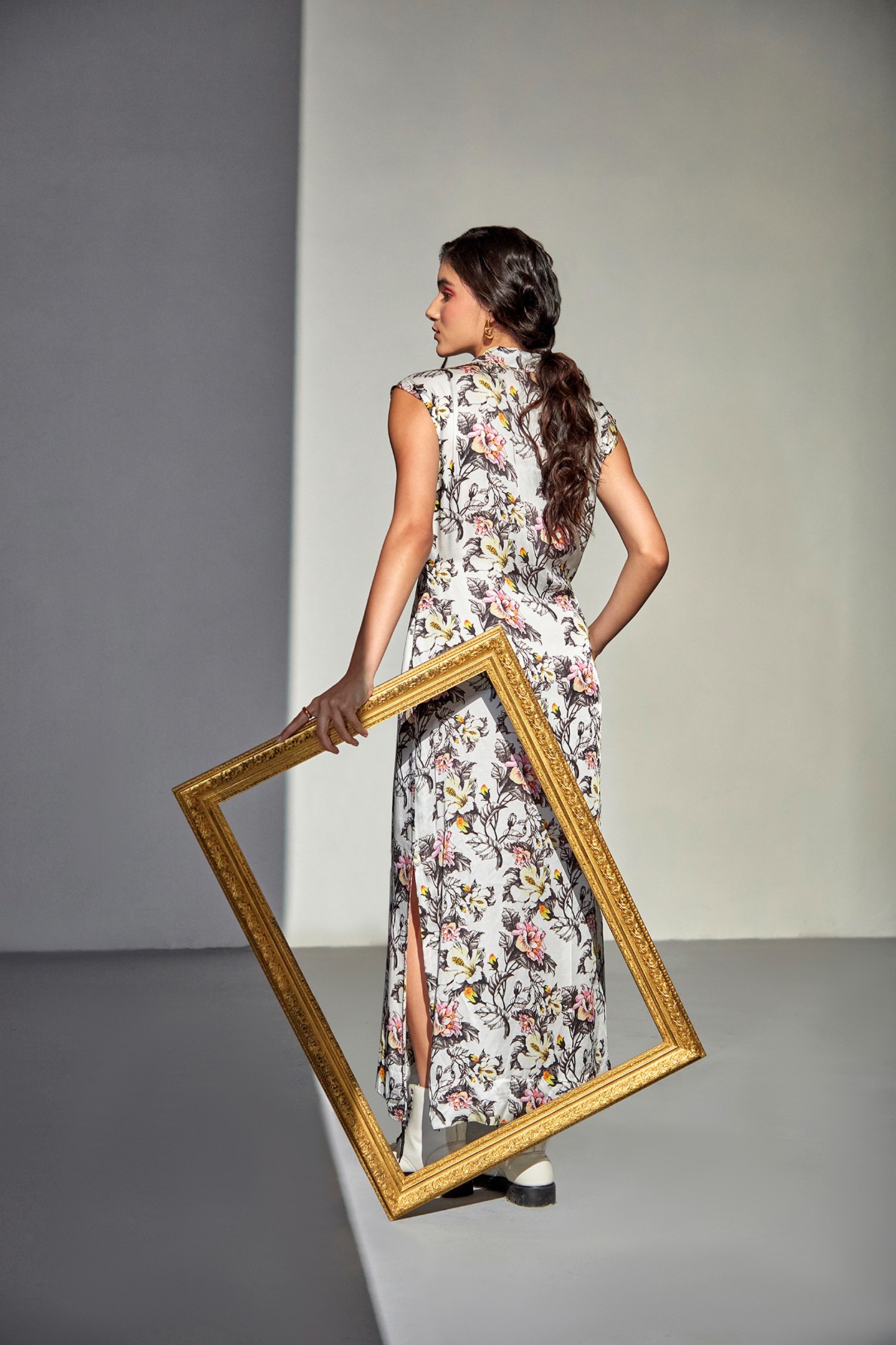 A model showcasing Moonrise Floral Dress by Zilaire from Zilaire's collection