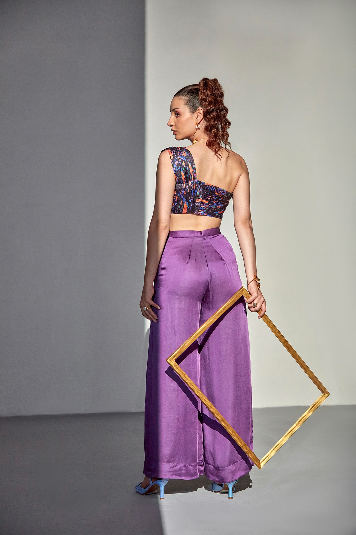 A model showcasing Moon Flower Purple Set by Zilaire from Zilaire's collection