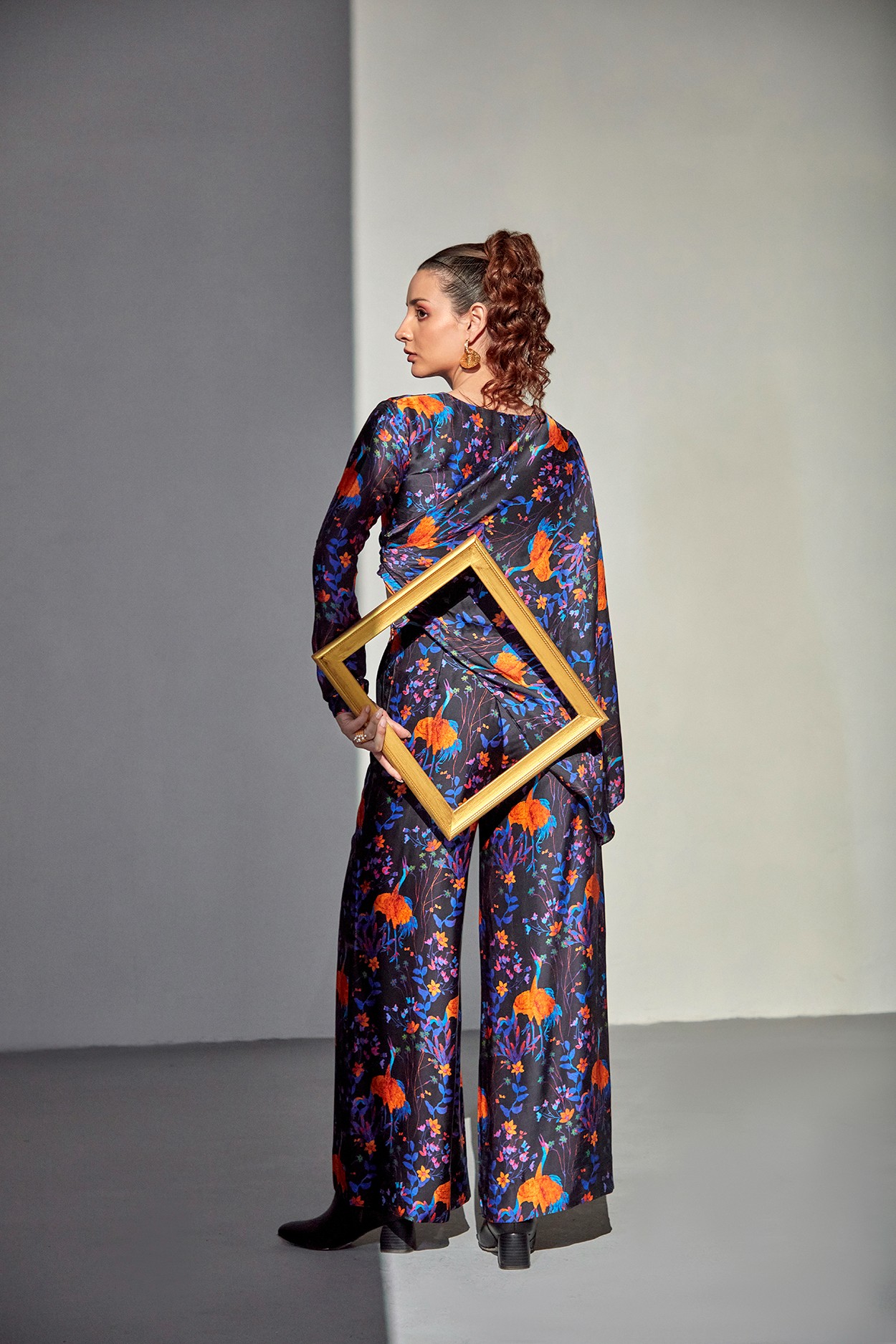 A model showcasing Moonlit Garden Set by Zilaire from Zilaire's collection