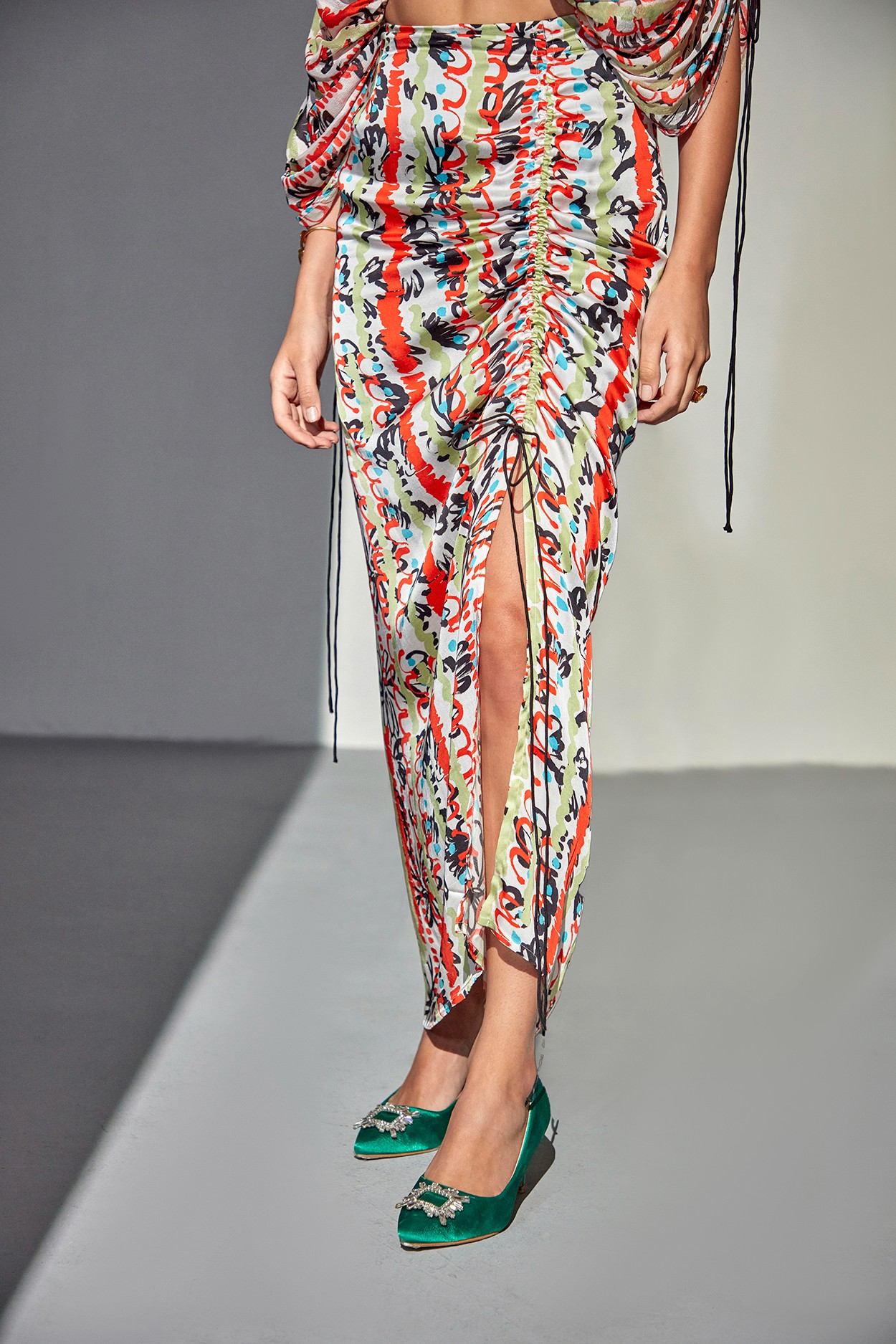 A model showcasing Mystic Flora Skirt Set by Zilaire from Zilaire's collection