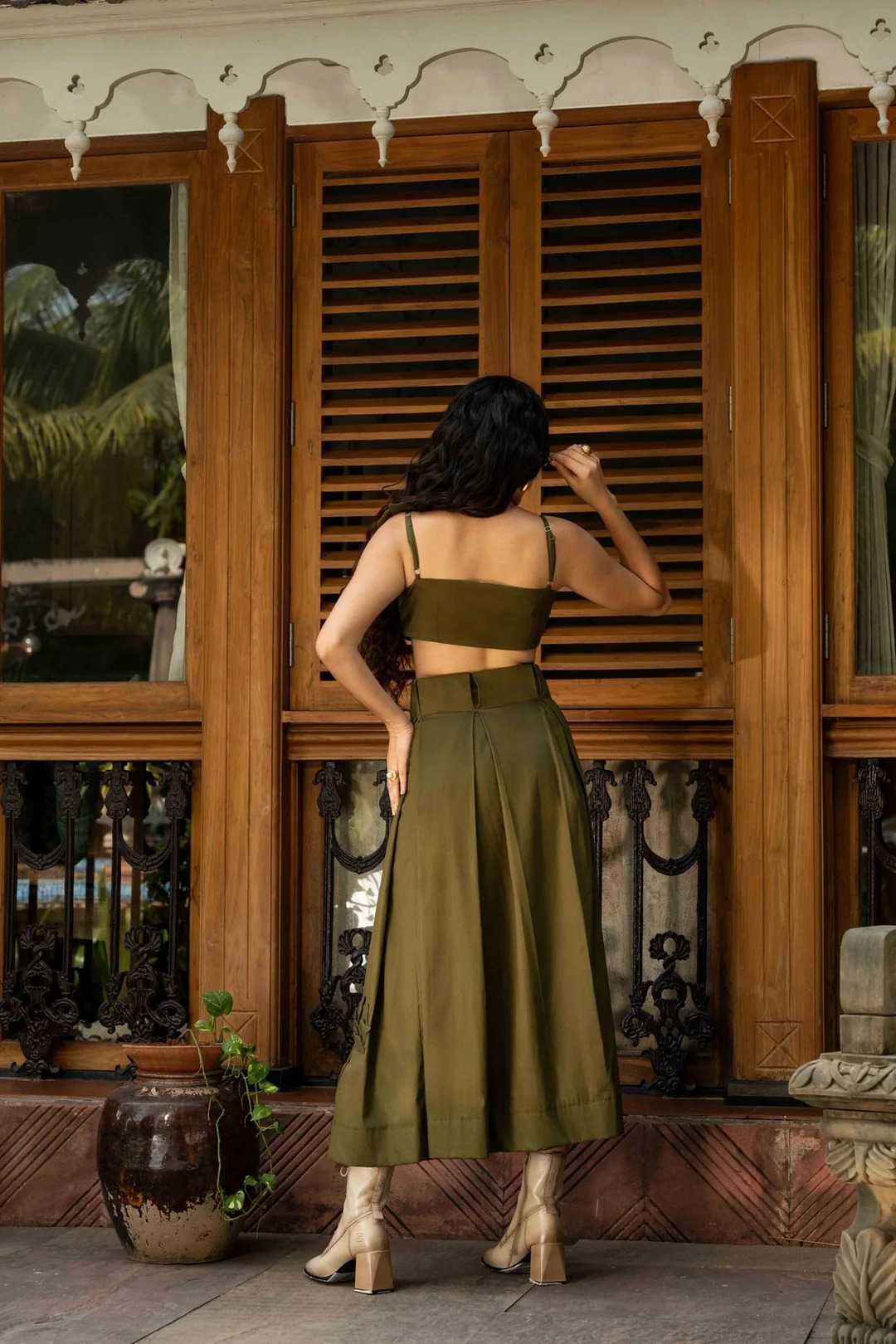A model showcasing Mattia Green Cotton Set by Zilaire from Zilaire's collection