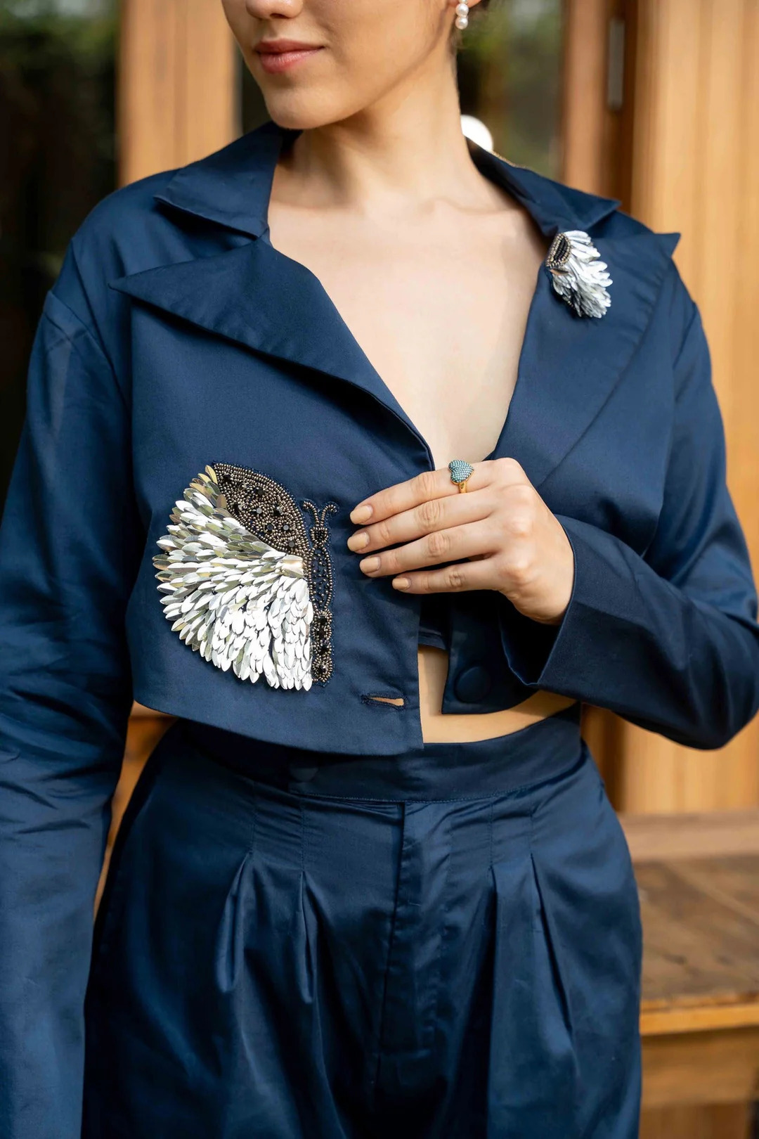 A model showcasing Marcella Blue Coord Set by Zilaire from Zilaire's collection